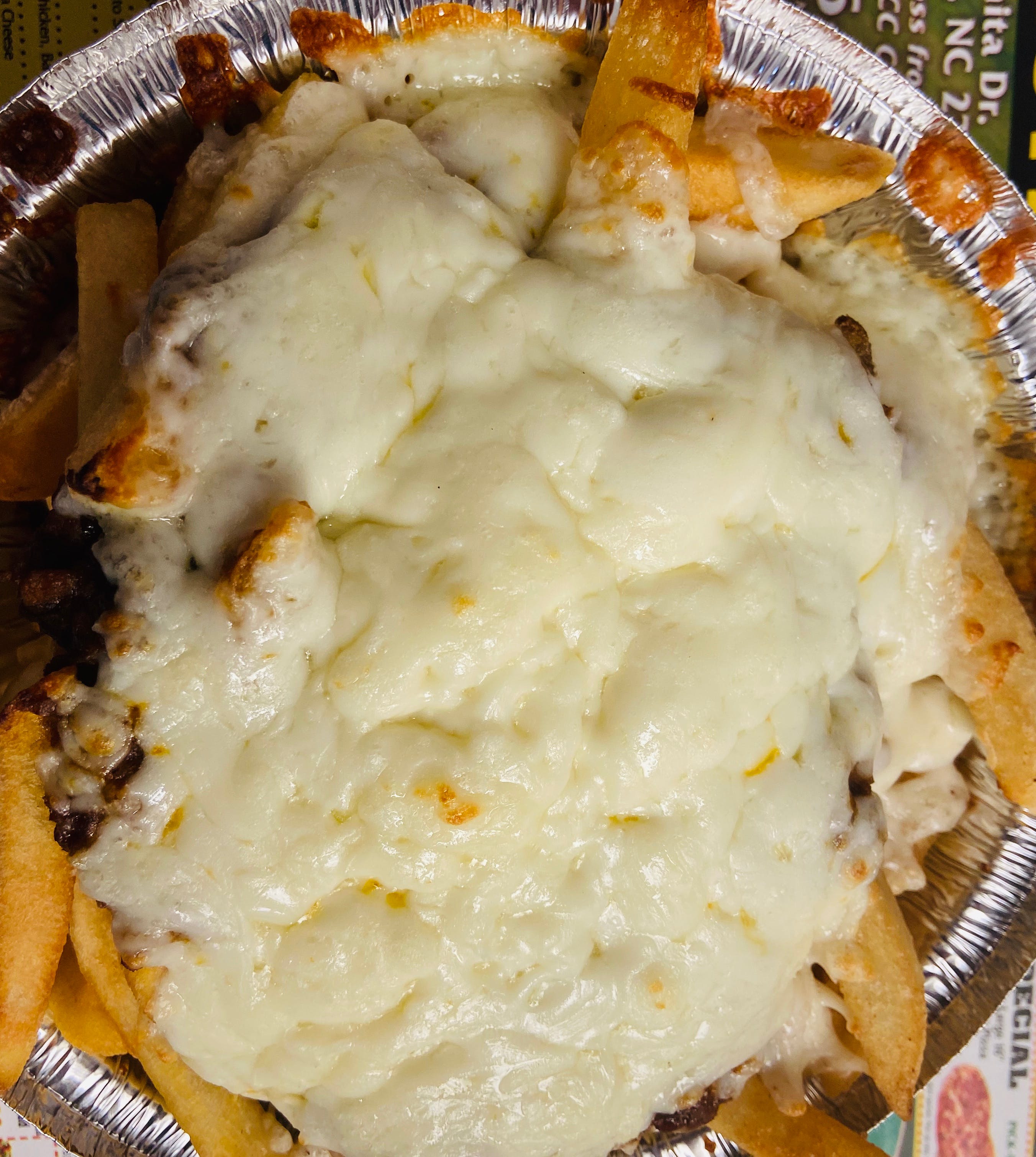 Order Chilli Cheese Fries - Appetizer food online from Bejta's Pizza & Subs store, Greensboro on bringmethat.com