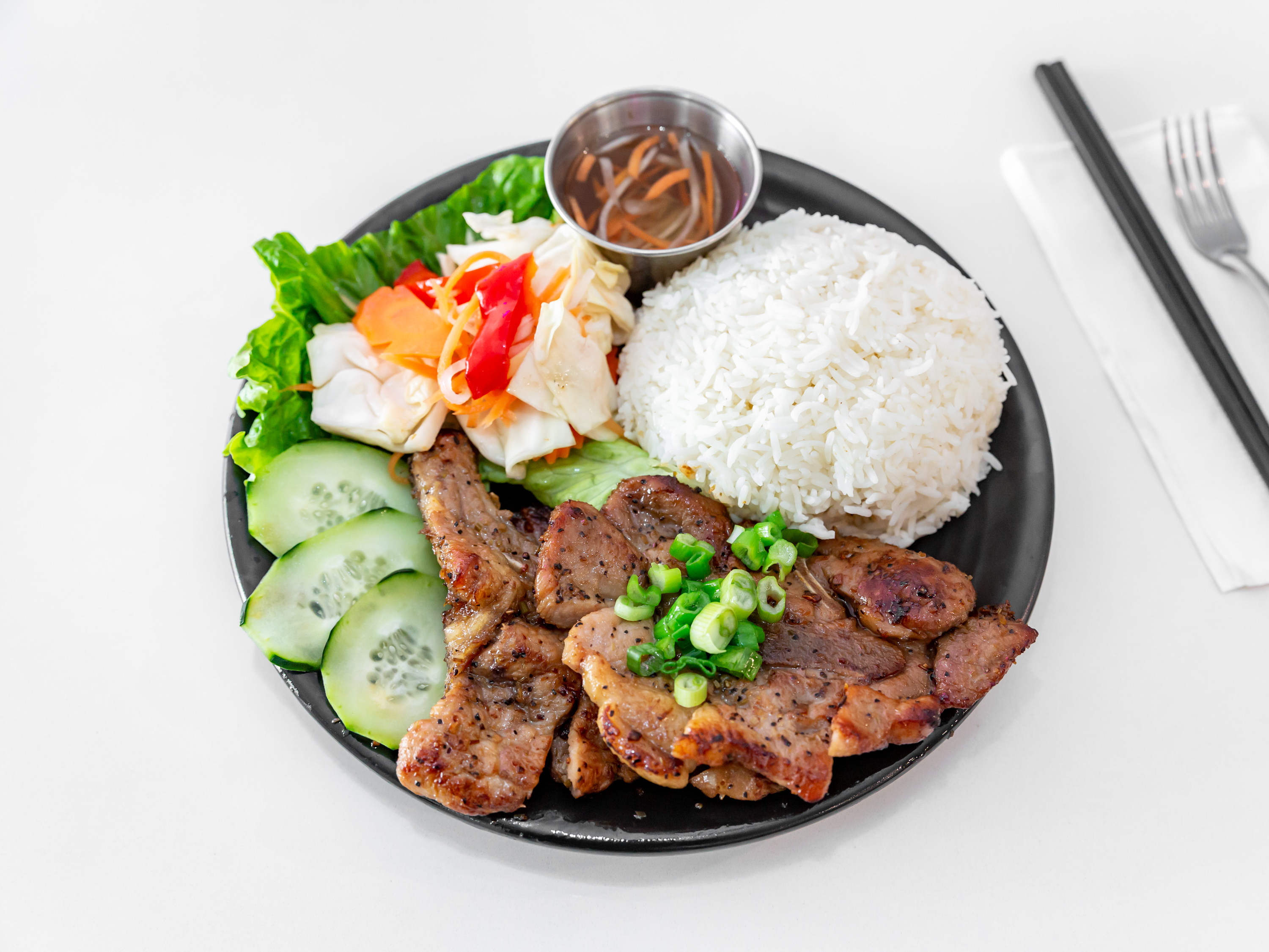Order Pork Chop Rice Plate food online from Culantro & Basil Pho Bistro store, West Covina on bringmethat.com