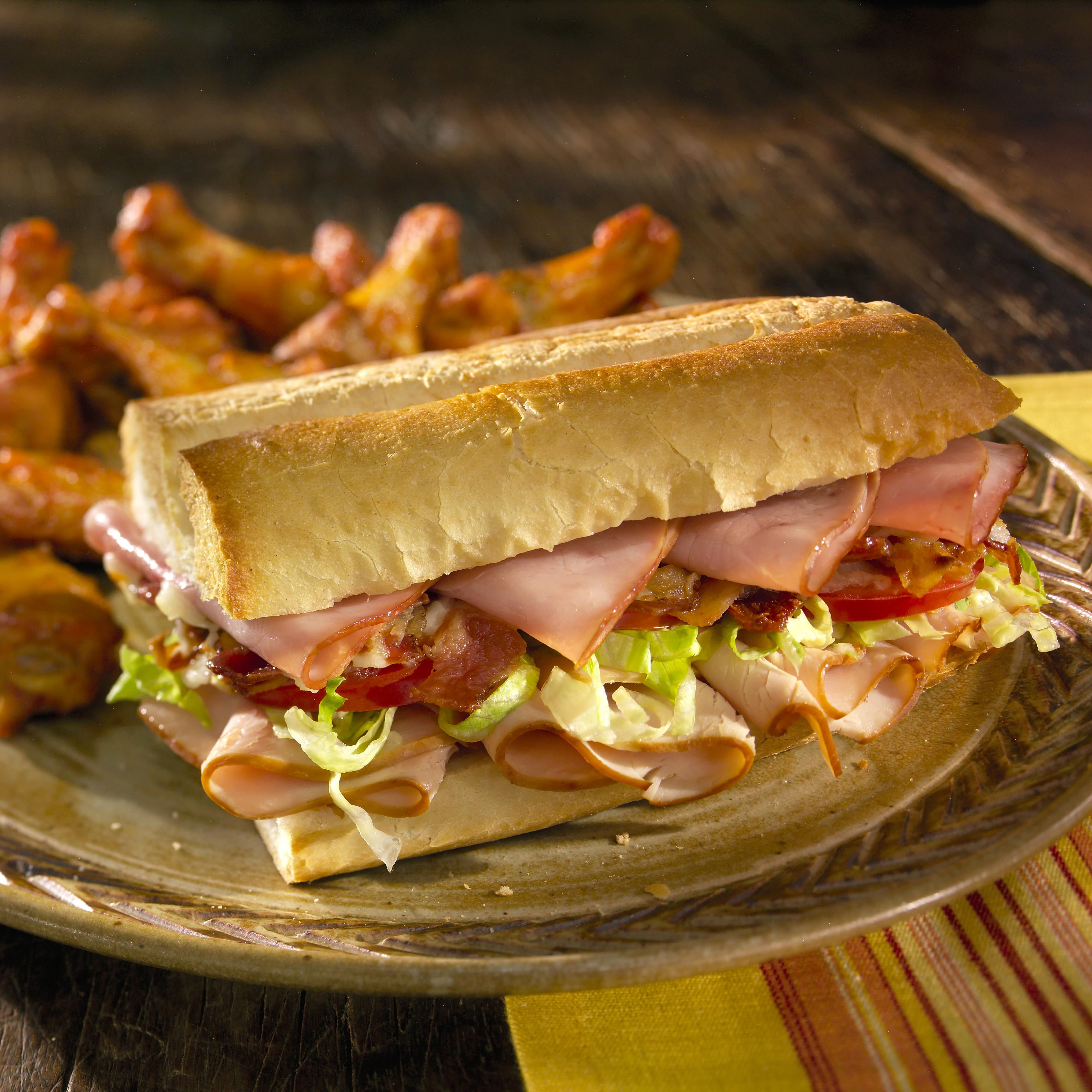 Order Turkey Club  Sandwich food online from 500 Degrees By Bucks Pizza store, Hidalgo on bringmethat.com