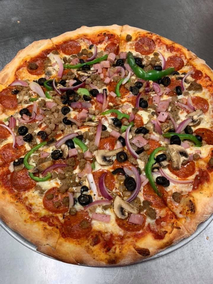 Order Supreme Pizza - Medium 12'' (8 Slices) food online from Bella Pizzeria store, Collierville on bringmethat.com