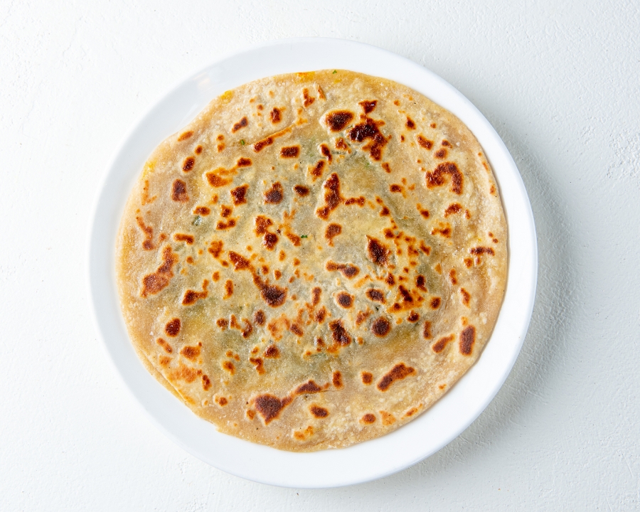 Order Onion Kulcha food online from Southern Spice store, Irvine on bringmethat.com