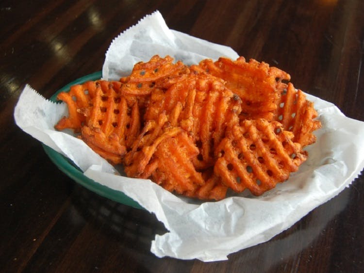 Order Sweet Potato Waffle Fries - Appetizer food online from Claymont Steak Shop store, Claymont on bringmethat.com
