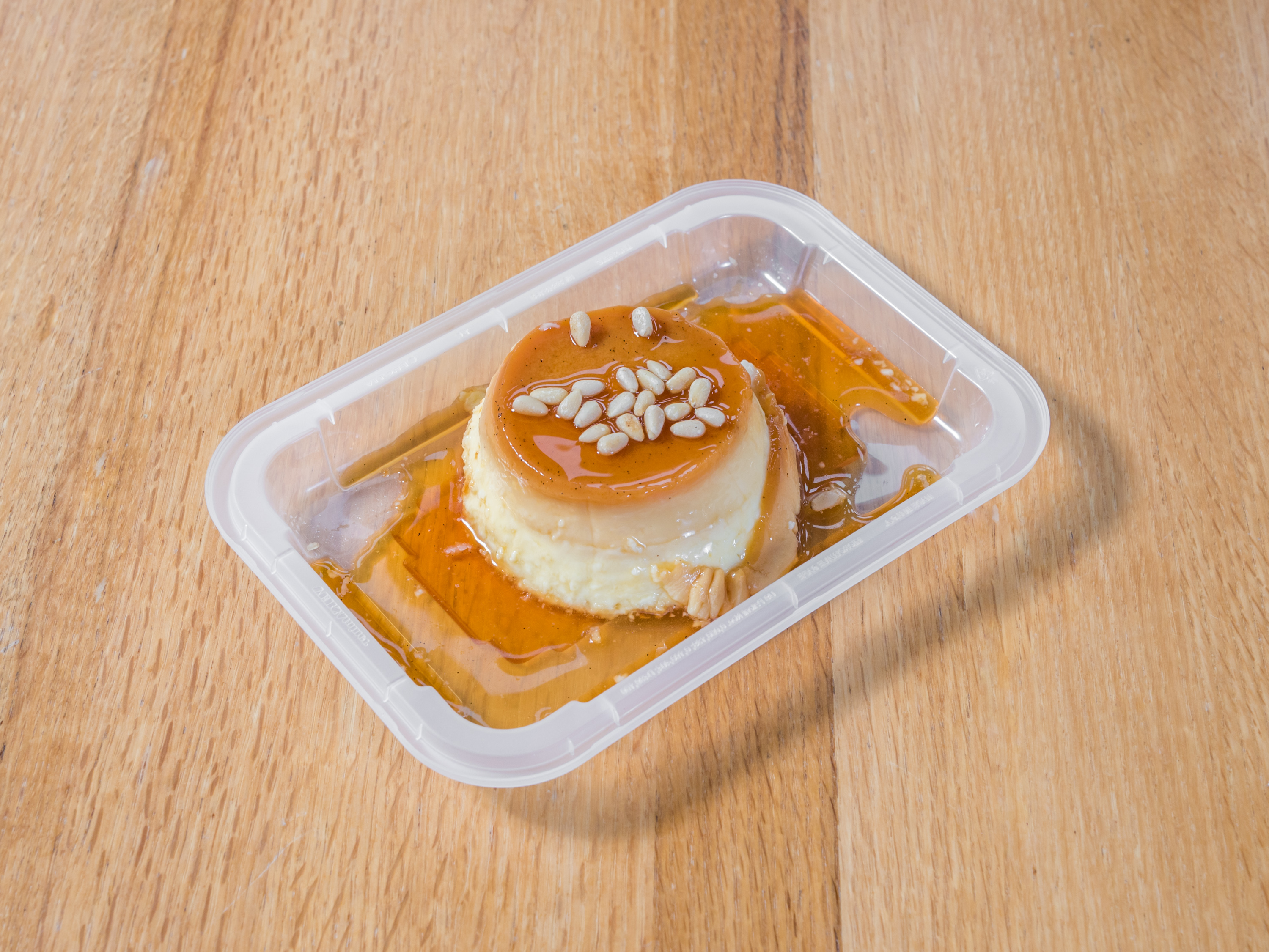 Order Spanish Flan food online from High Noon Restaurant & Saloon store, Albuquerque on bringmethat.com