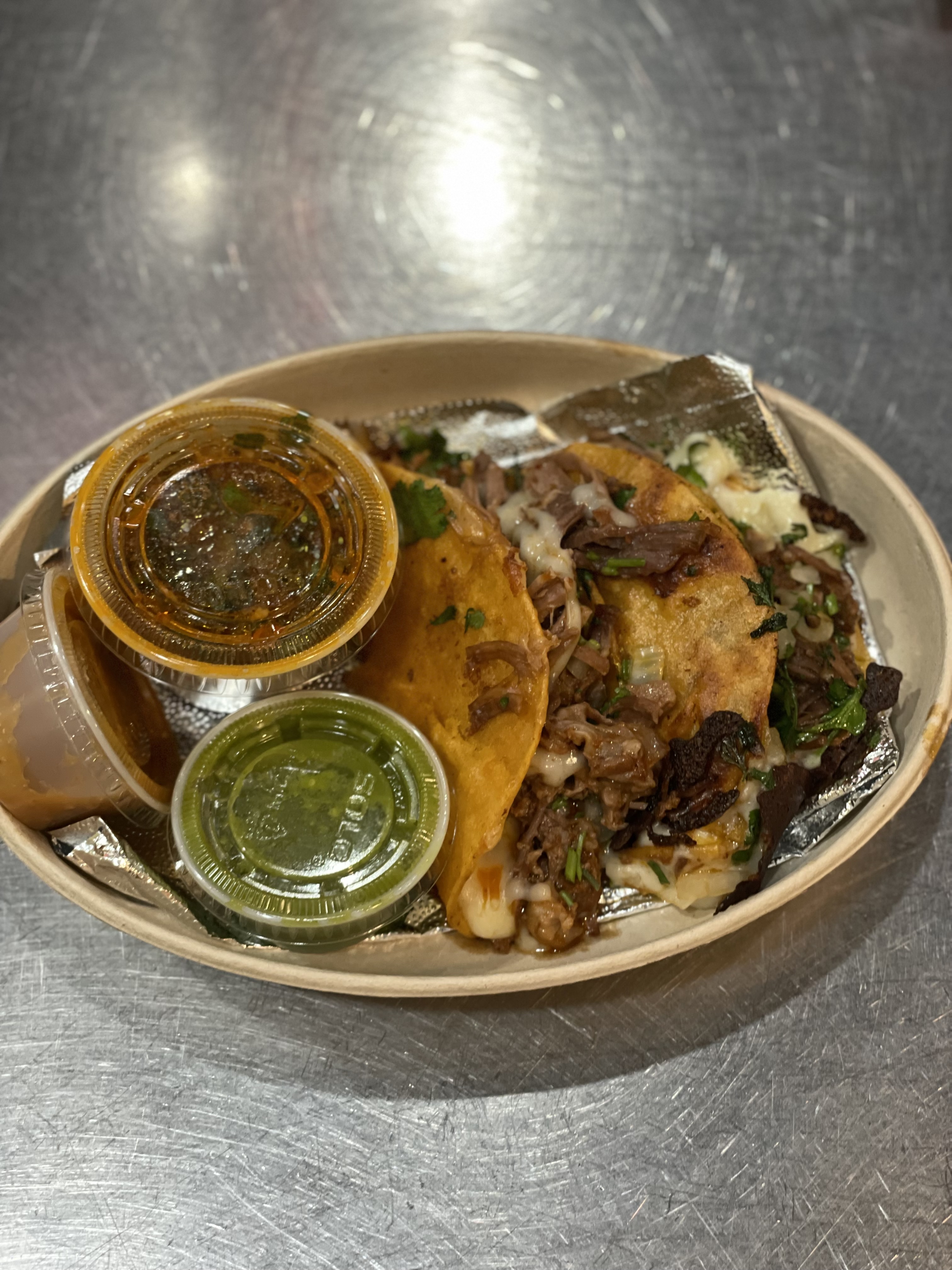 Order 2 Birria Tacos food online from El paso mexican grill store, Brooklyn on bringmethat.com