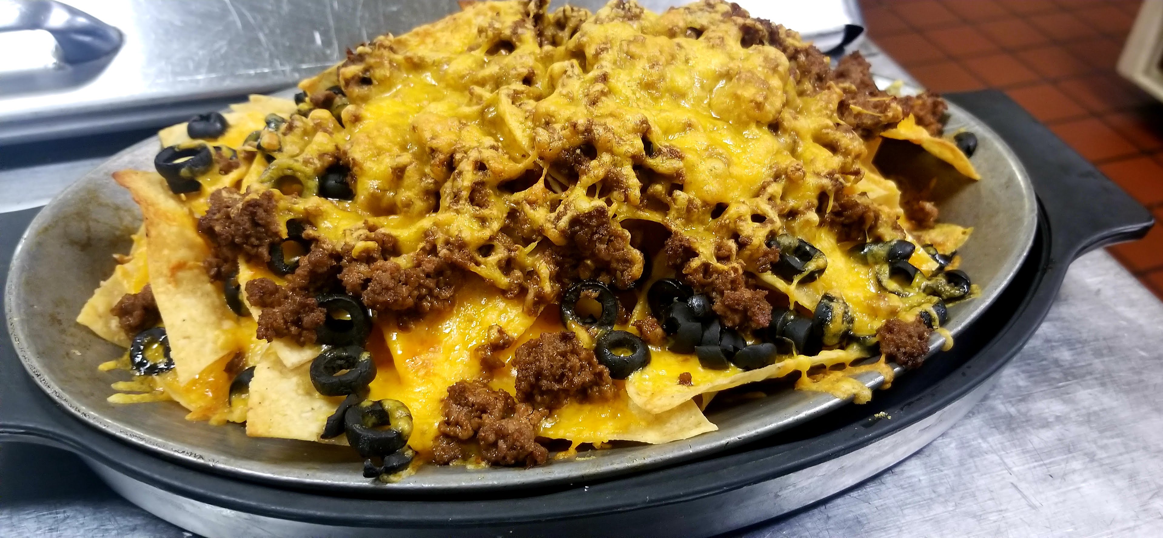 Order Cheese Nachos Appetizer food online from Your Mothers Bar store, Mount Clemens on bringmethat.com