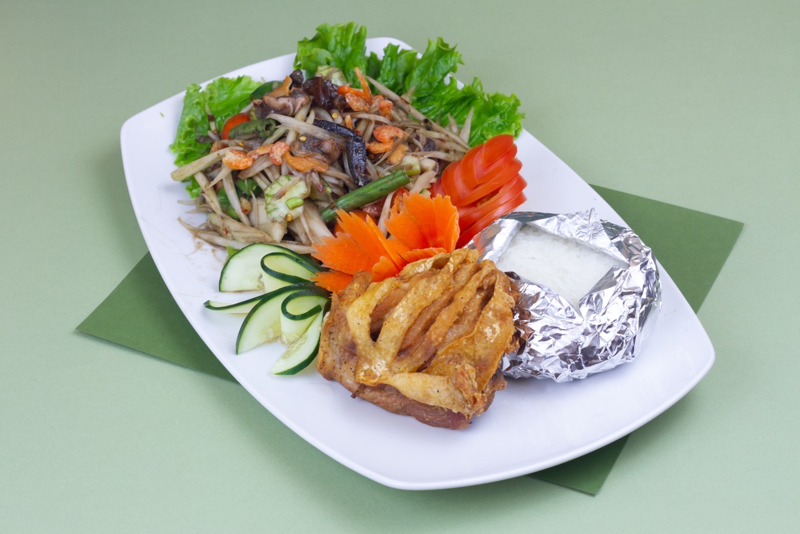 Order Thum Lao Style ( ตำลาว เสริฟพร้อม ไก่ทอด+ข้าวเหนียว ) food online from Aroi Thai store, San Diego on bringmethat.com