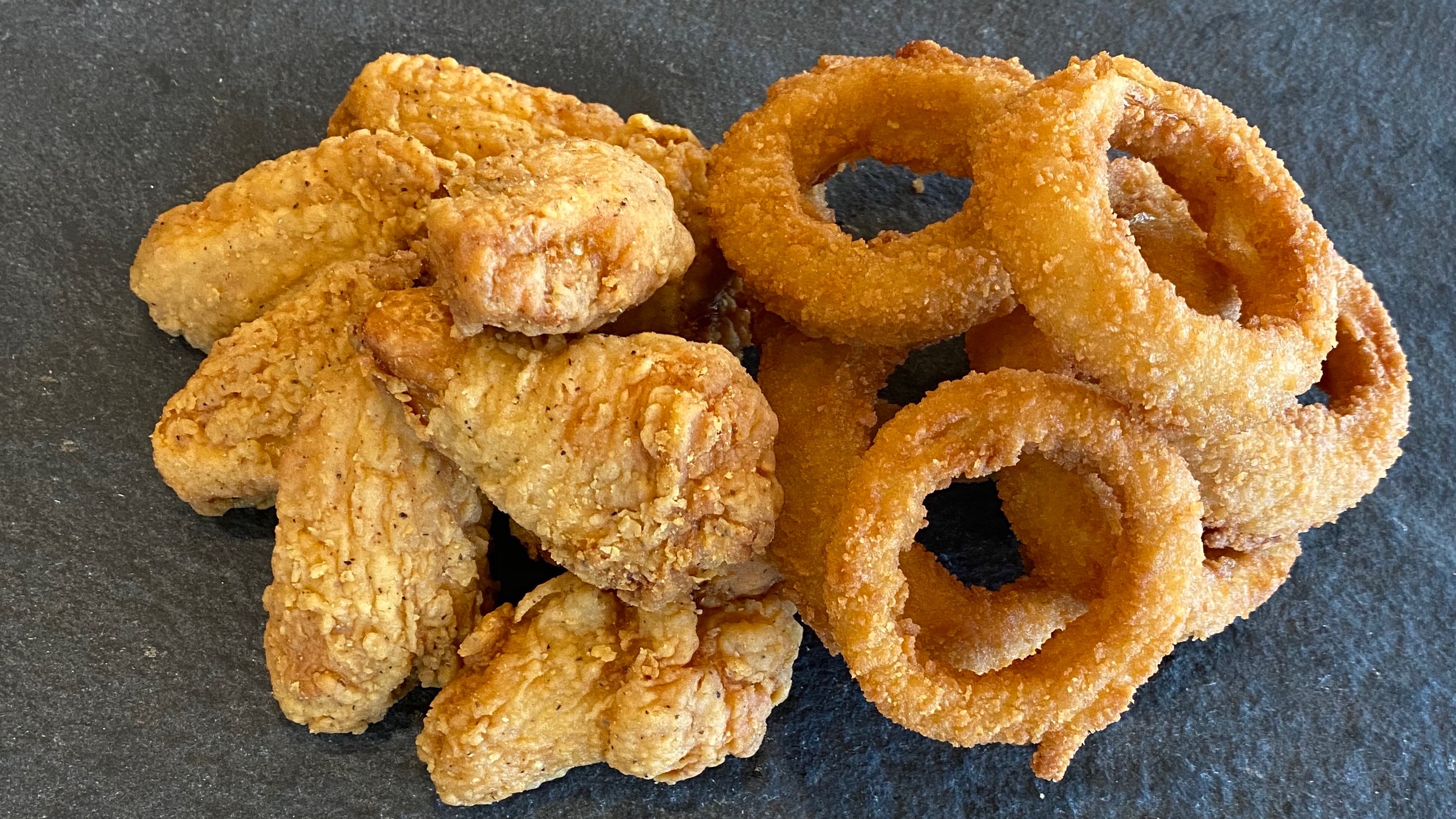 Order 6 Wings and Onion Rings food online from Sizzler store, Downey on bringmethat.com