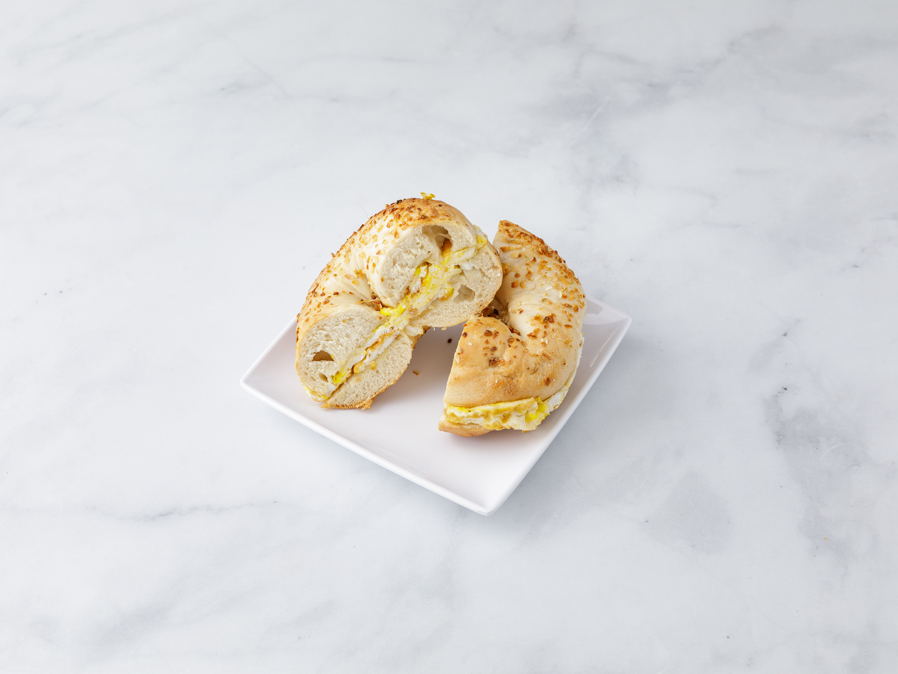 Order 1 Egg on a Bagel food online from Bread Brothers Bagel Cafe store, Brooklyn on bringmethat.com