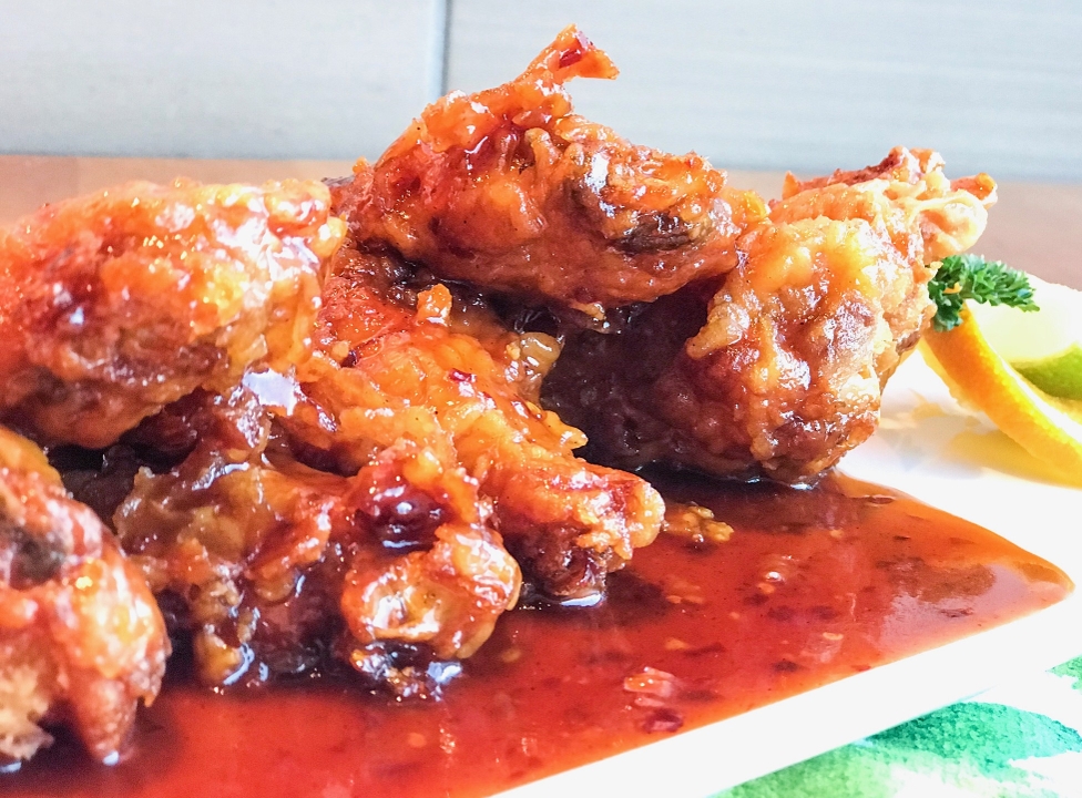 Order Spicy Chicken Wings food online from Hot Woks Cool Sushi store, Chicago on bringmethat.com