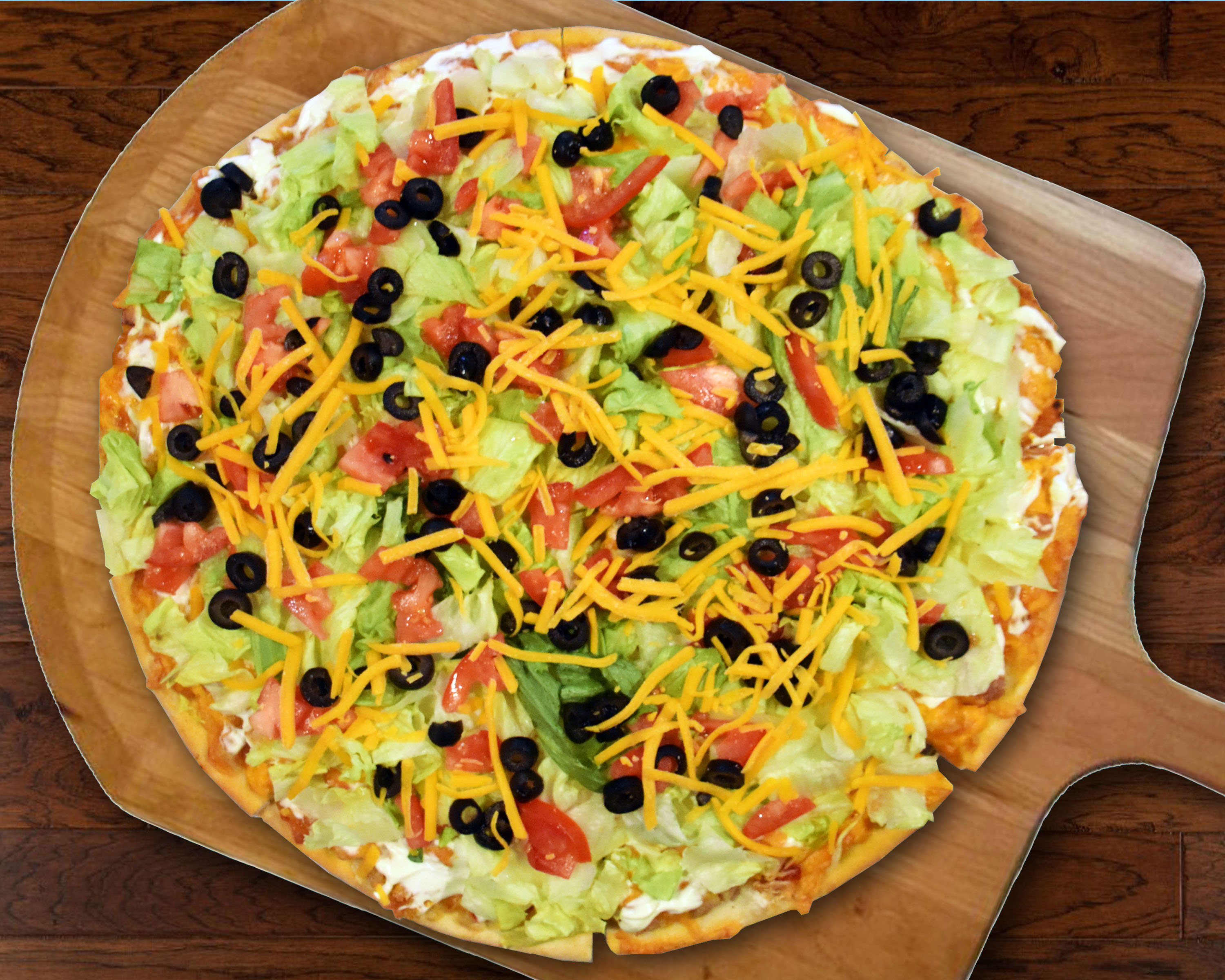 Order Taco Crust Thin Pizza food online from Beggars Pizza store, Blue Island on bringmethat.com