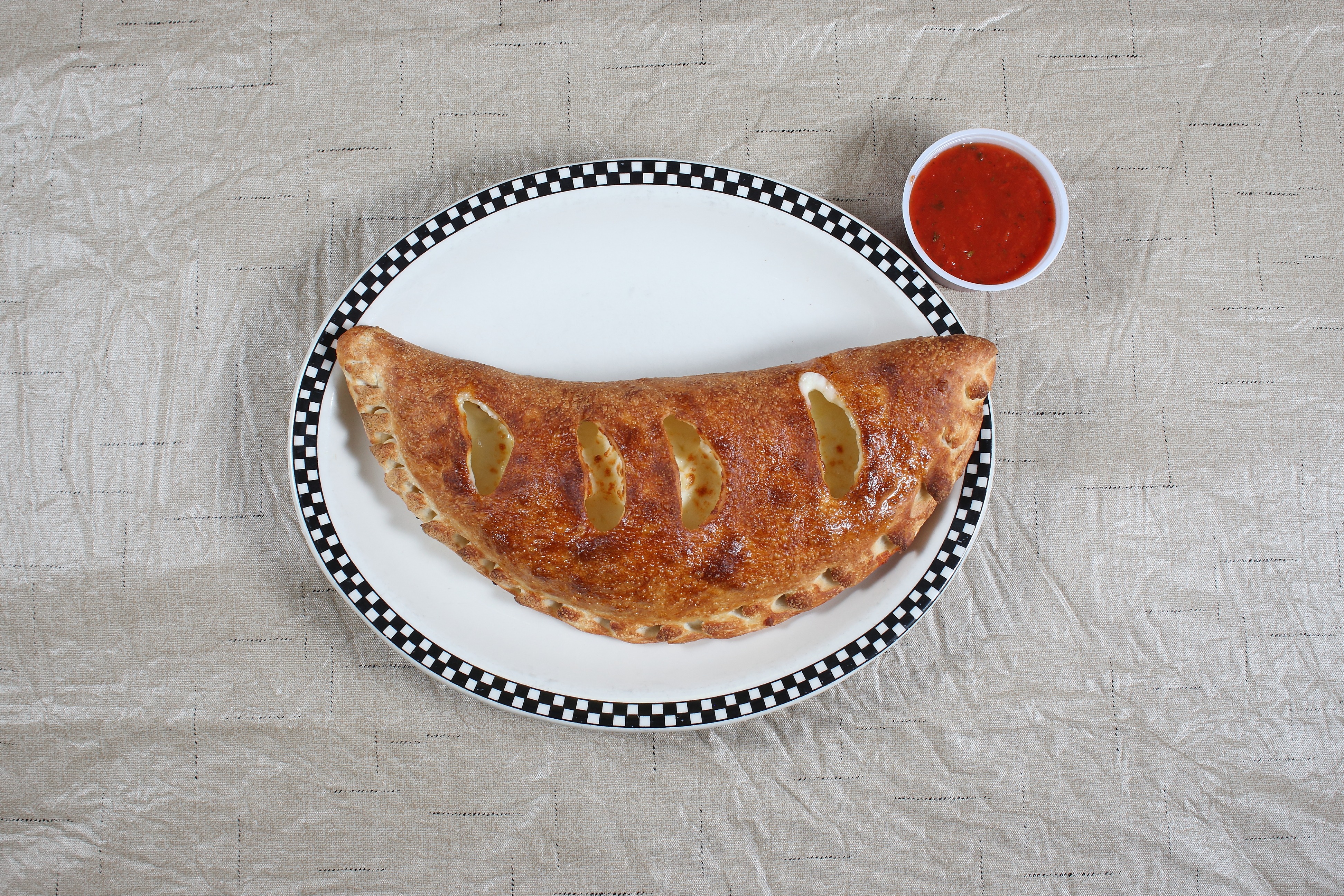 Order Cheese Calzone food online from Village Pizza store, Tega Cay on bringmethat.com