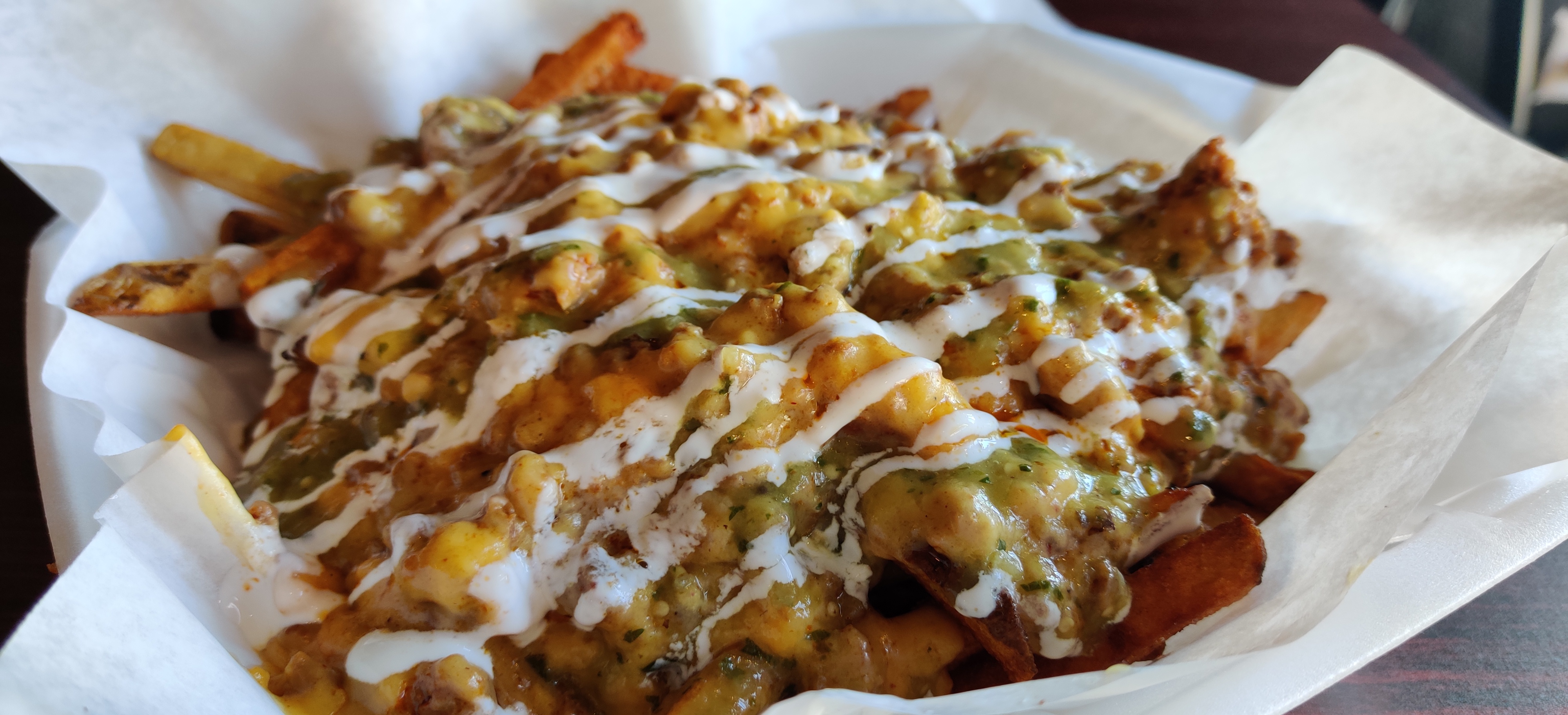 Order Chorizo Cheese Fries  food online from Scratch Kitchen & Lounge store, Forest Park on bringmethat.com