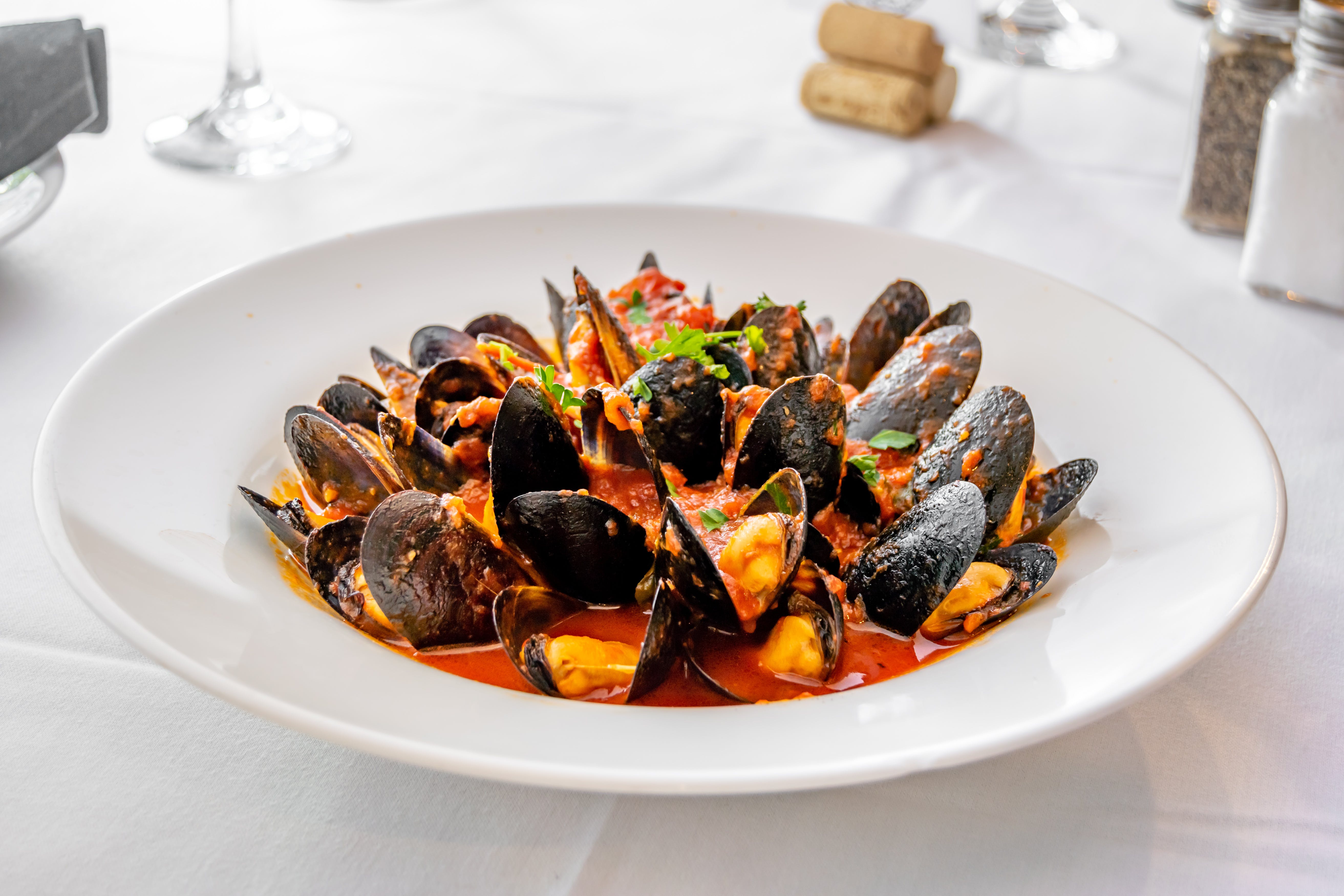Order Mussels Marinara - Appetizer food online from Portofino's Restaurant store, Morristown on bringmethat.com