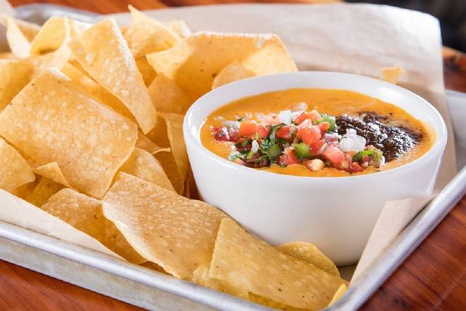 Order Chipotle Queso & Chips food online from Twin Peaks store, Fargo on bringmethat.com