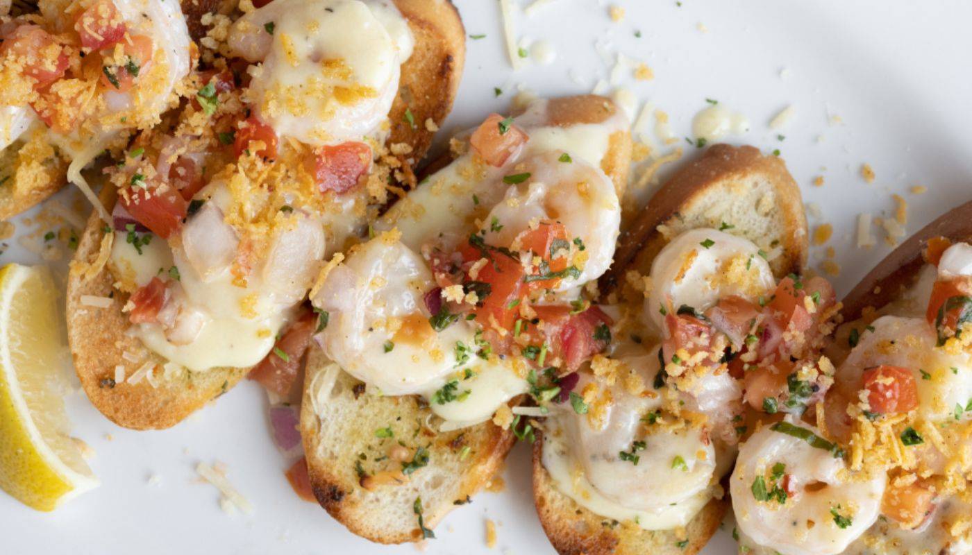 Order Shrimp Bruschetta food online from Green Mill store, PLYMOUTH on bringmethat.com