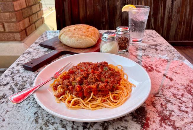 Order Spaghetti w/ Meat Sauce food online from Anthony's Eatalian store, Dallas on bringmethat.com