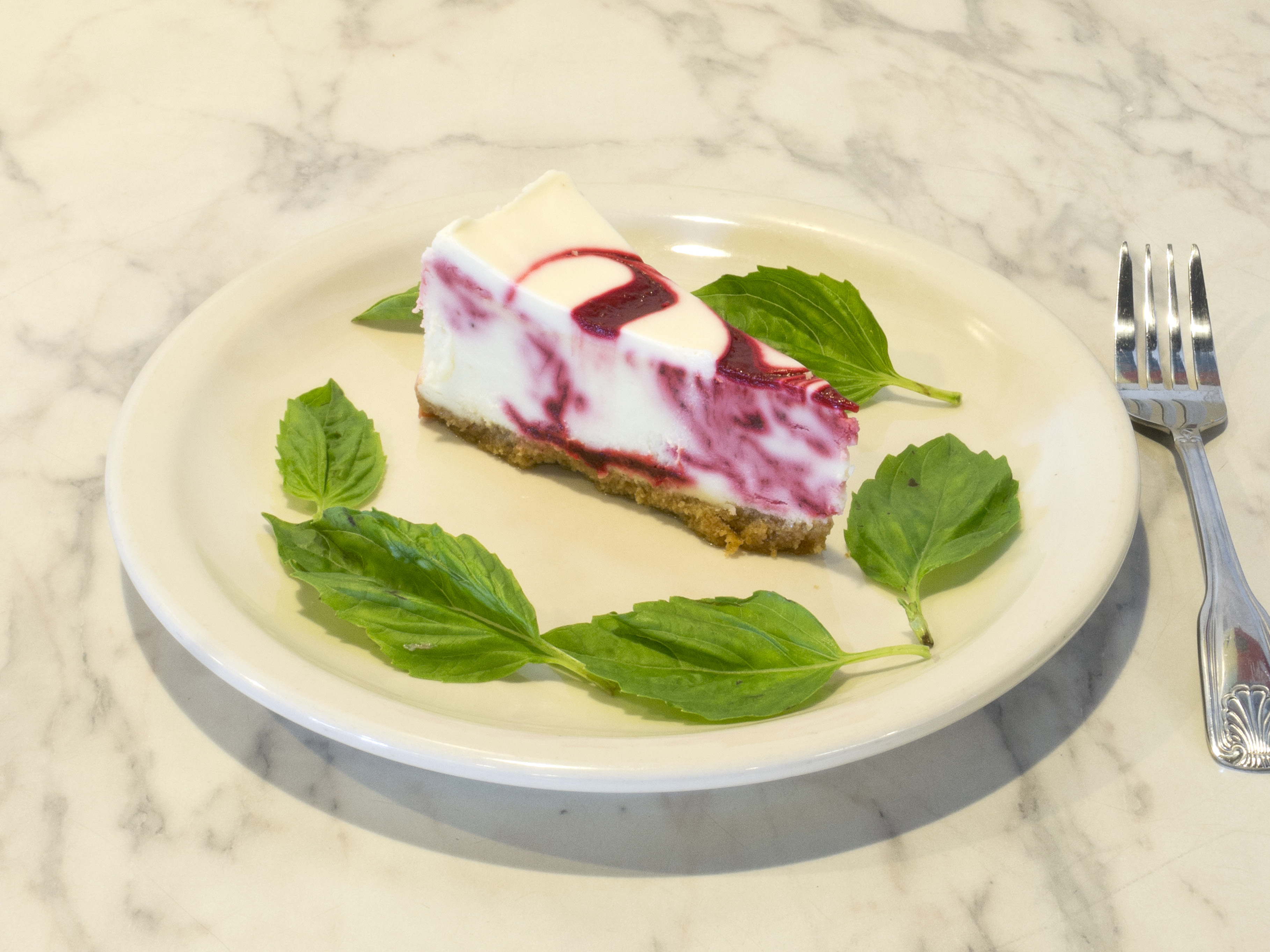 Order Strawberry Swirl Cheesecake food online from Luigis Pizza store, Frisco on bringmethat.com