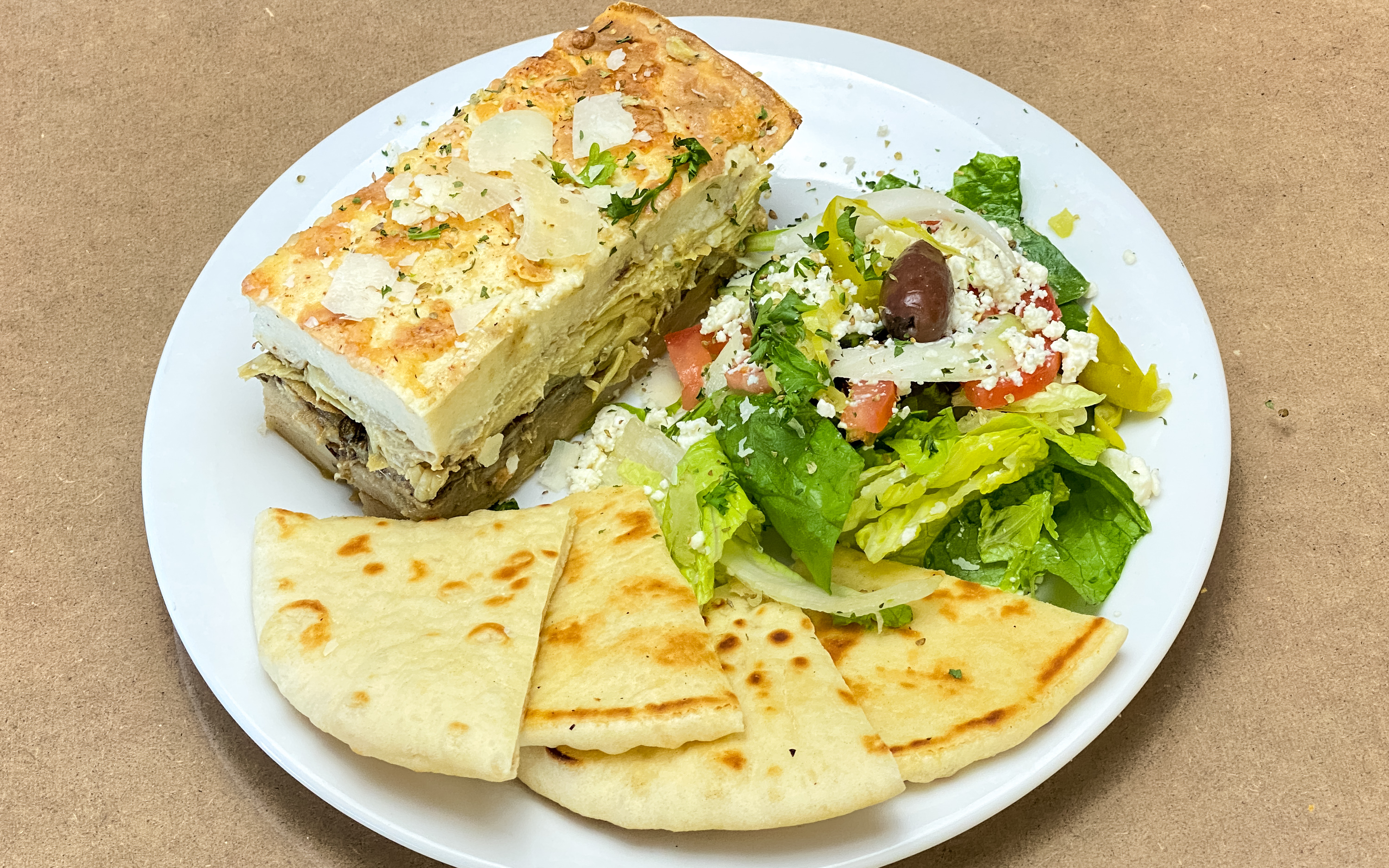 Order Veggie Moussaka food online from Mina And Dimi Greek House store, San Antonio on bringmethat.com