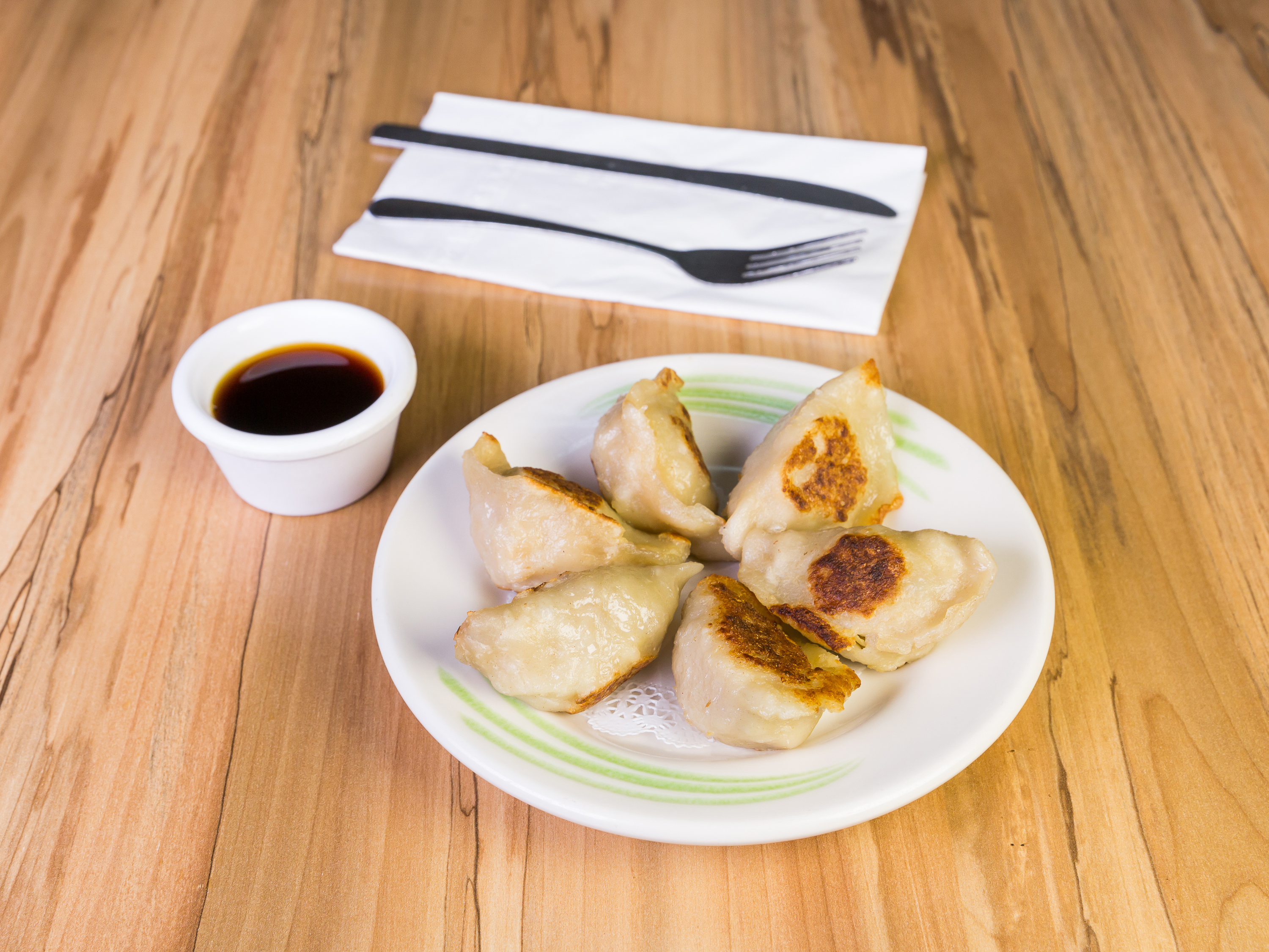Order 6 Pot Sticker food online from Uncle Yips Seafood and Dim Sum store, Cincinnati on bringmethat.com
