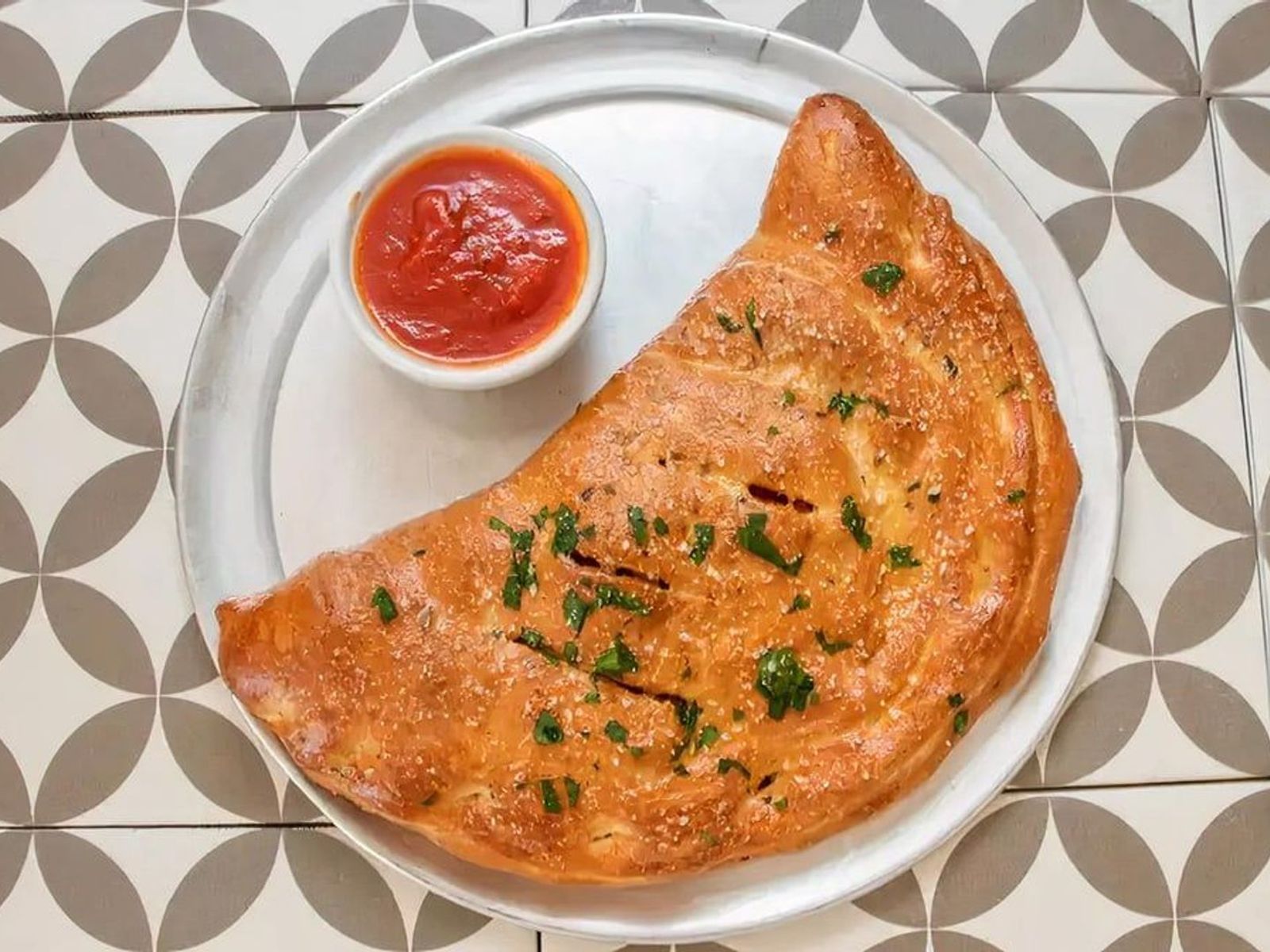 Order CALZONE food online from Pepperoni's Pizza store, Fulshear on bringmethat.com