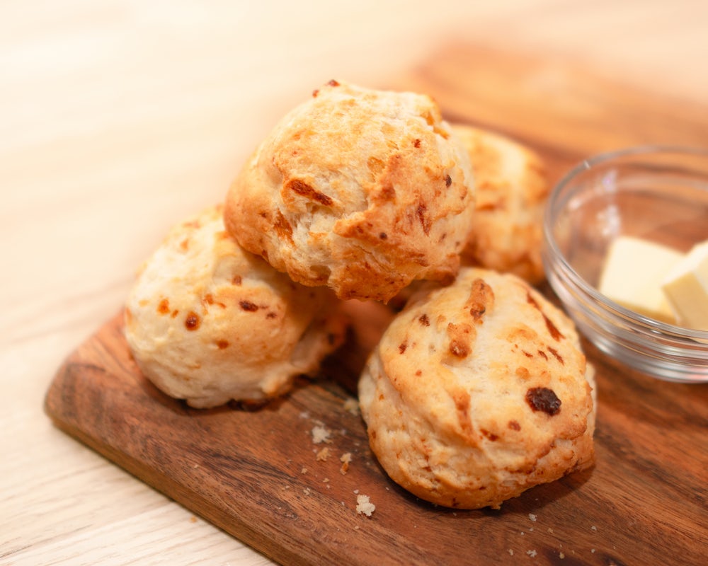 Order Biscuit 4-Pack with Honey Butter food online from Kin & Co. Comfort Kitchen store, Boulder on bringmethat.com