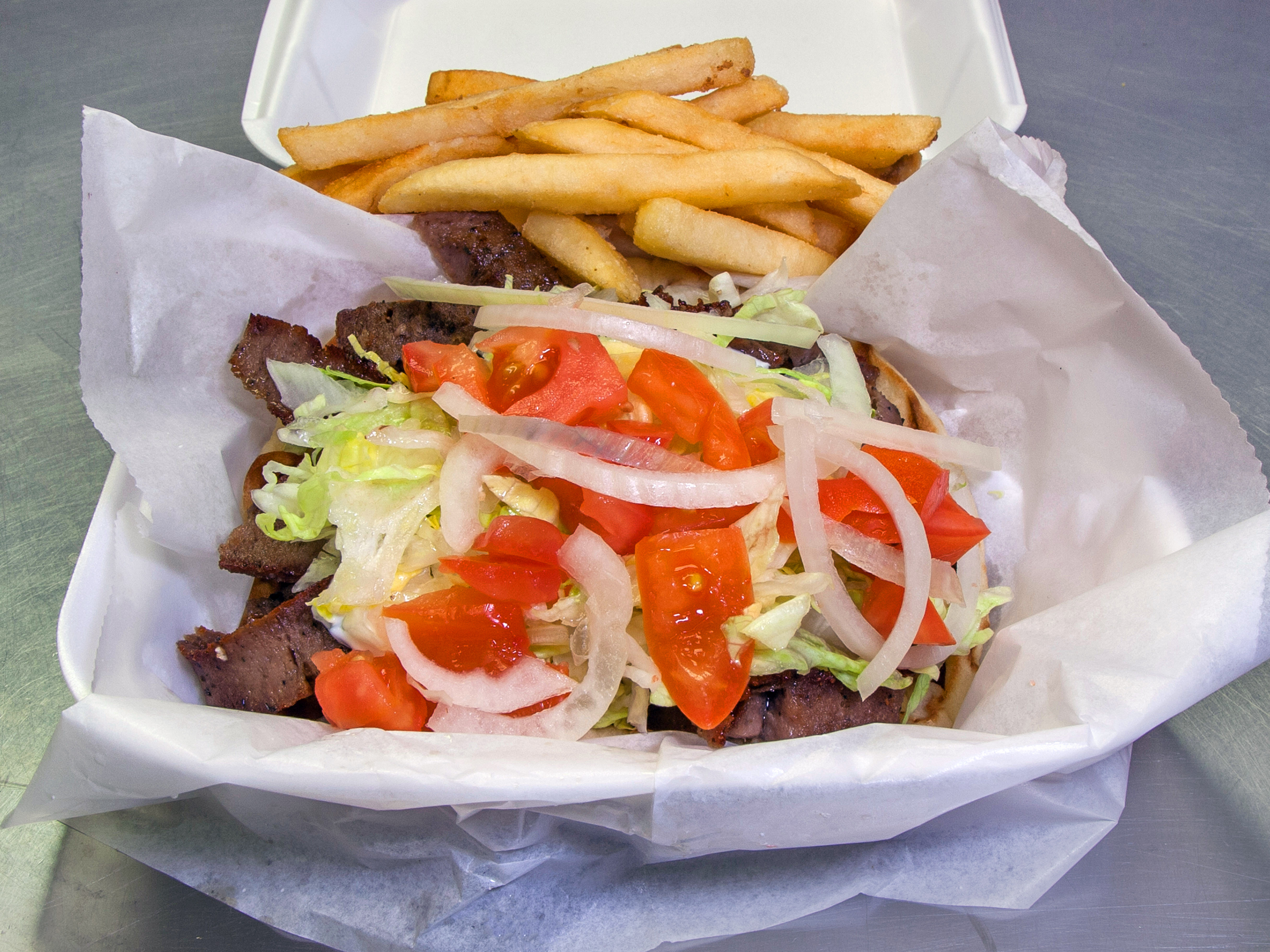 Order Gyro Pizza Puff food online from Tasty Chicken & Salad store, Chicago on bringmethat.com