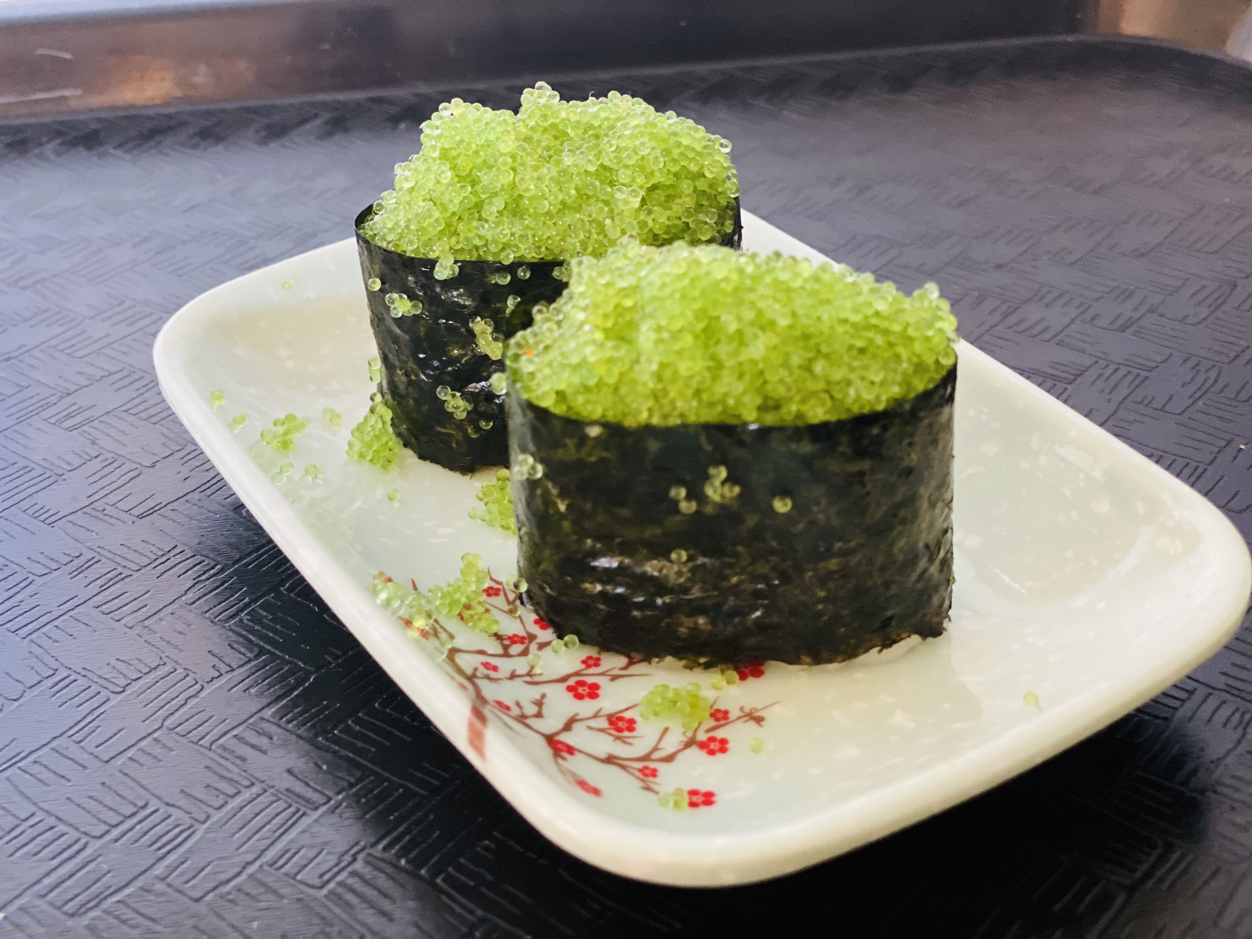Order 57. Tobiko Nigiri 飞鱼籽贴面 food online from Tengu Sushi store, Newport on bringmethat.com