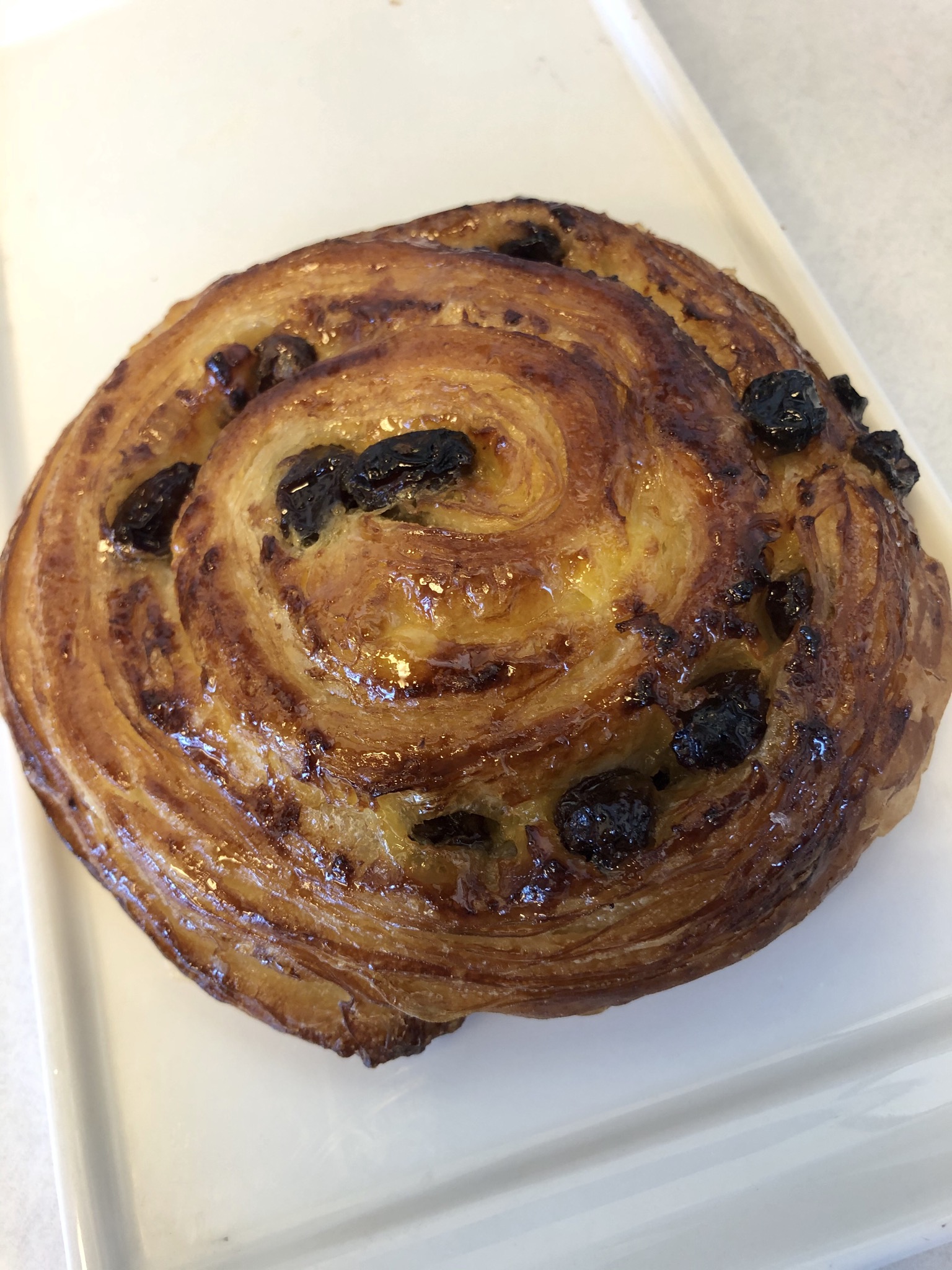 Order Pain Aux Raisins food online from Dore Bakery store, Brentwood on bringmethat.com