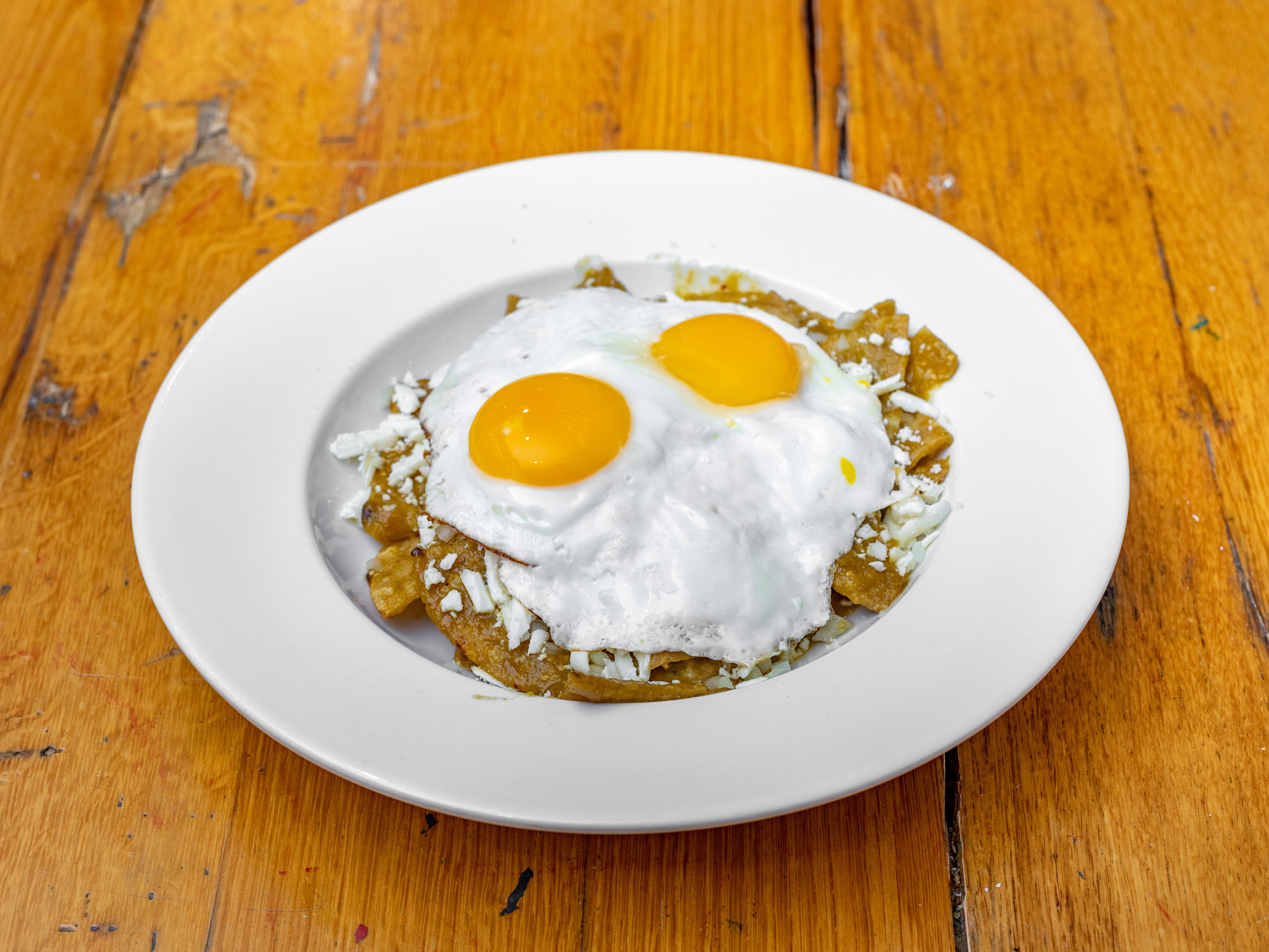 Order GREEN CHILAQUILES food online from Thiago's Restaurant store, Chicago on bringmethat.com