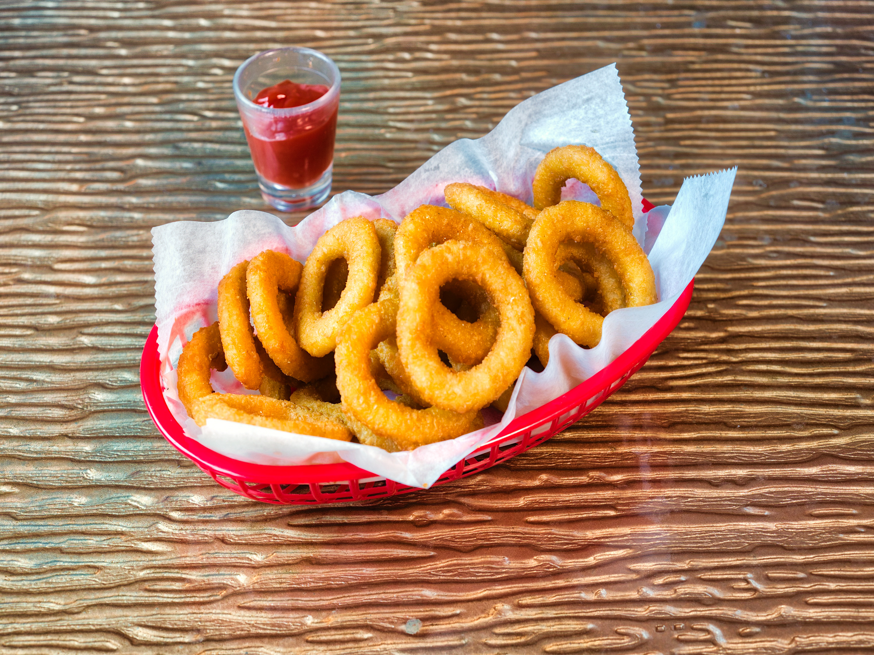 Order Onion Rings food online from Liberty Bar & Poutinerie store, Pontiac, MI on bringmethat.com