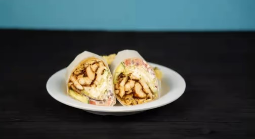 Order Grilled Chicken Caesar Wrap food online from Greek Xpress store, East Rockaway on bringmethat.com