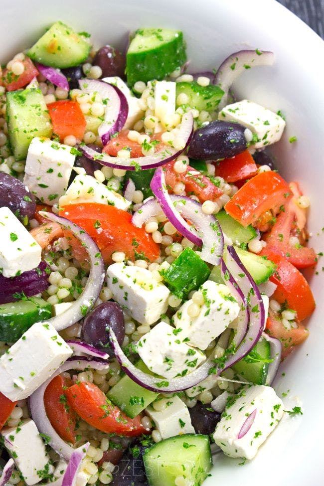 Order Greek Salad - Salad food online from Pellegrini Pizza store, Las Vegas on bringmethat.com