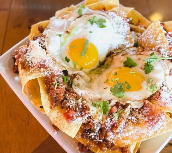 Order Tortilla Chip Chilaquiles food online from Monk's Bar & Grill store, Middleton on bringmethat.com