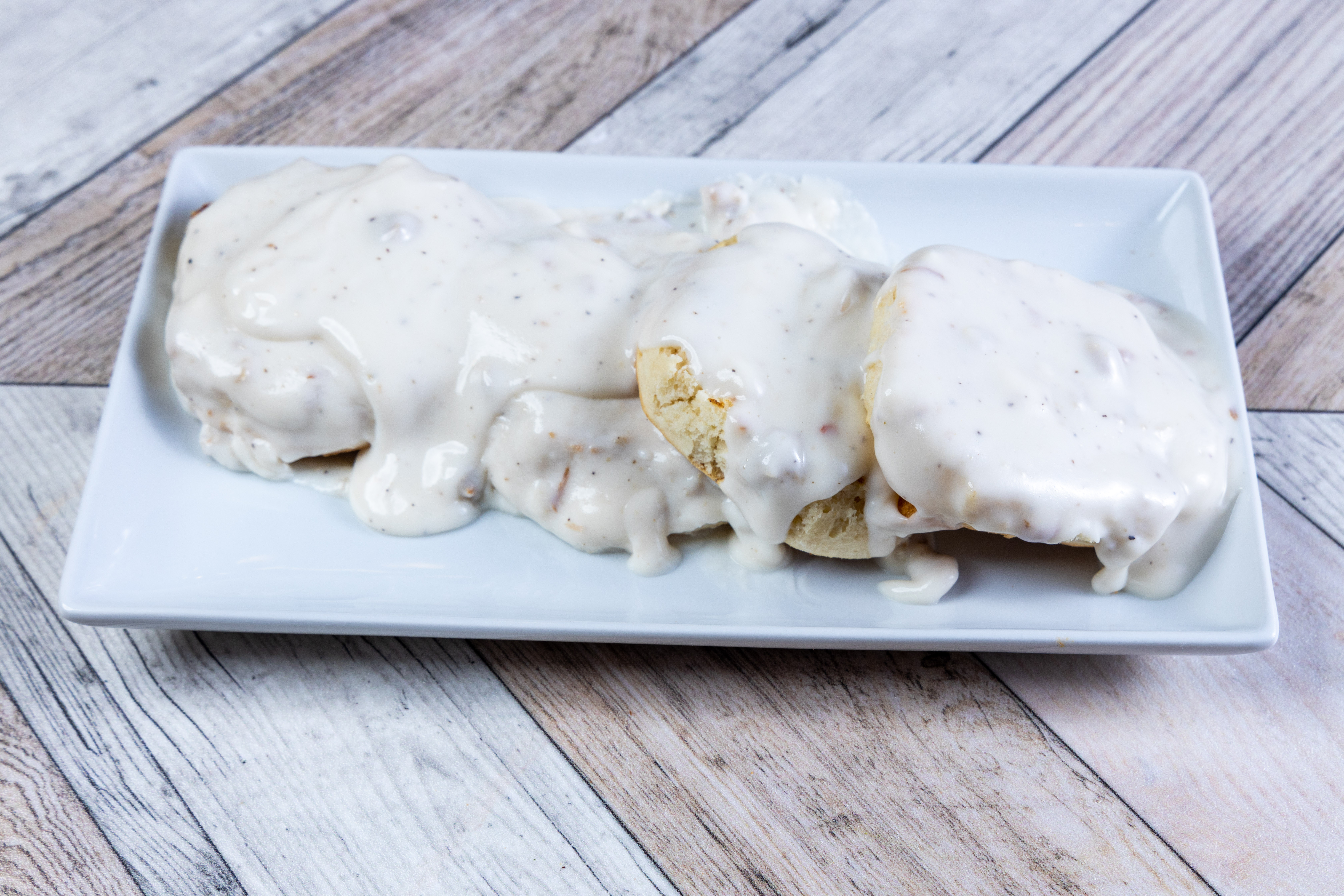 Order Full Biscuits & Gravy food online from Top View Restaurant store, Chicago on bringmethat.com