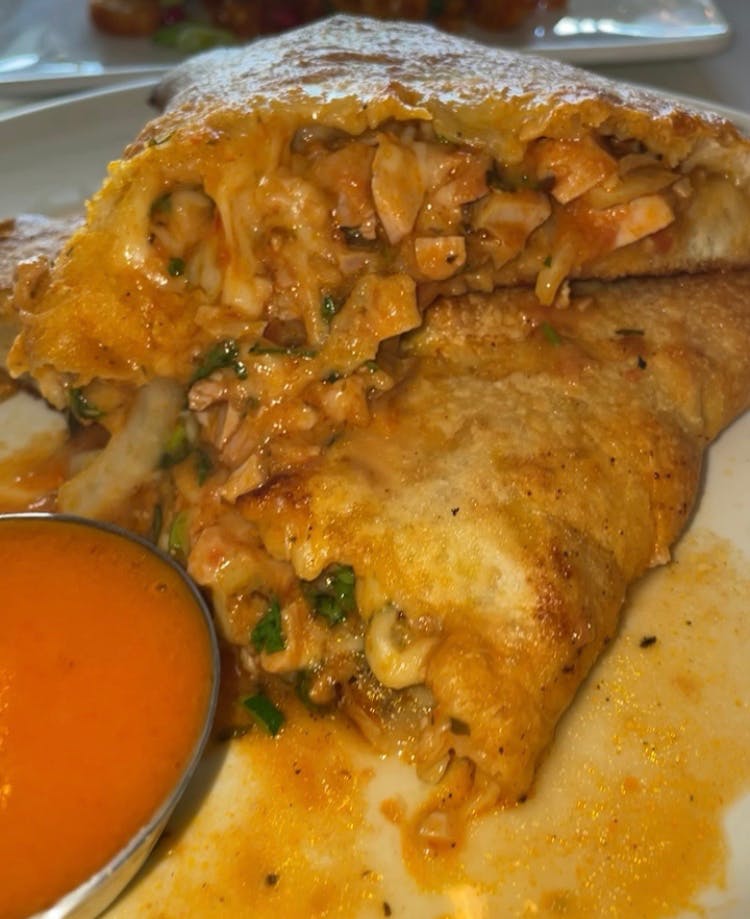 Order Butter Chicken Roll or Calzone food online from i2i Indian Italian Fusion store, Boonton on bringmethat.com