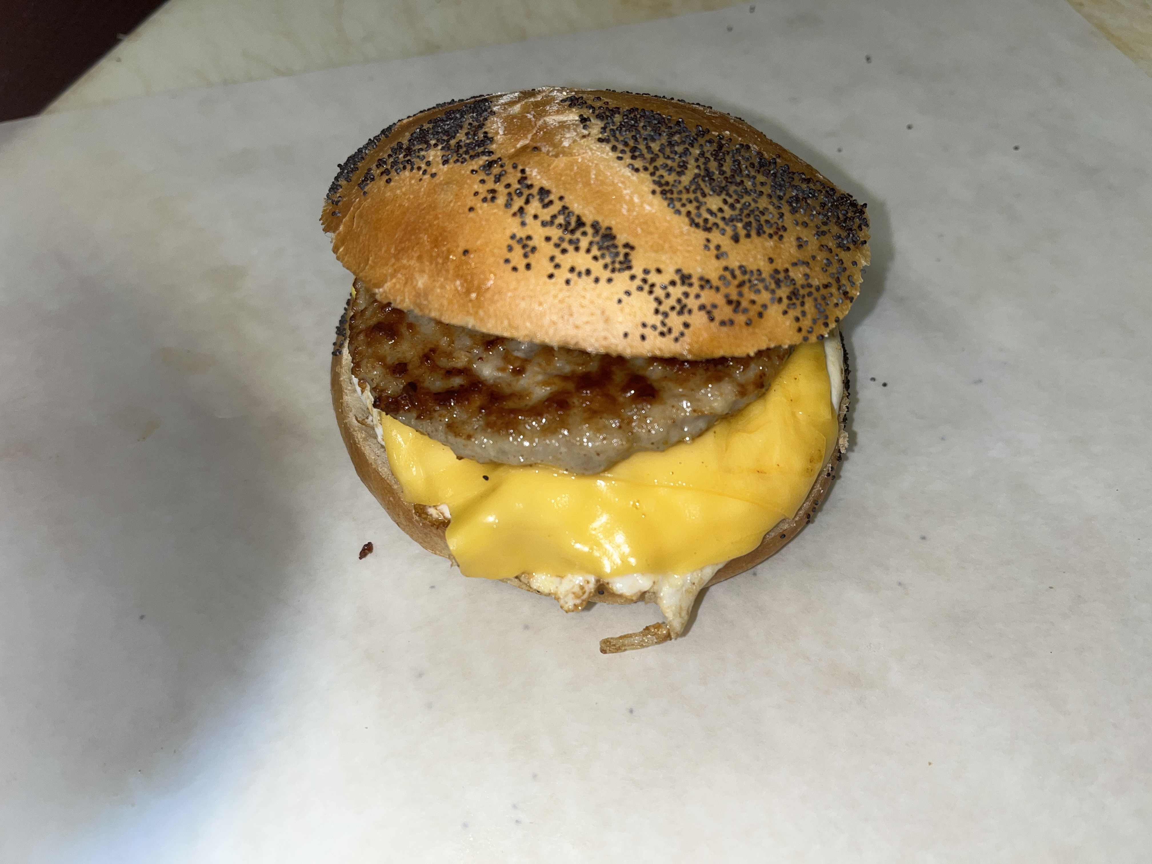 Order Two eggs with sausage and cheese on roll food online from Bagels N Brunch Deli store, Islip Terrace on bringmethat.com