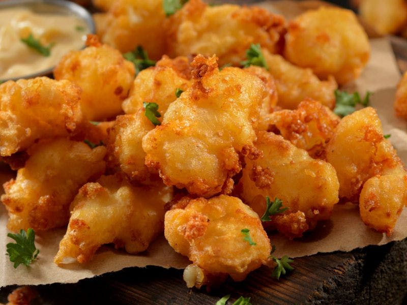 Order Cheese Curds - Appetizer food online from American Classic Pizzaria store, Billings on bringmethat.com