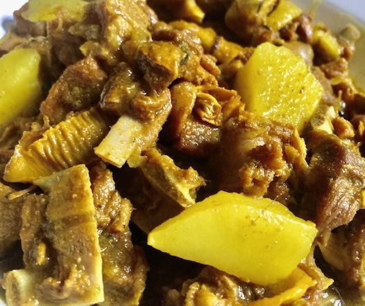 Order Curry Goat   food online from Island Flavaz Jerk Seafood Center store, Uniondale on bringmethat.com