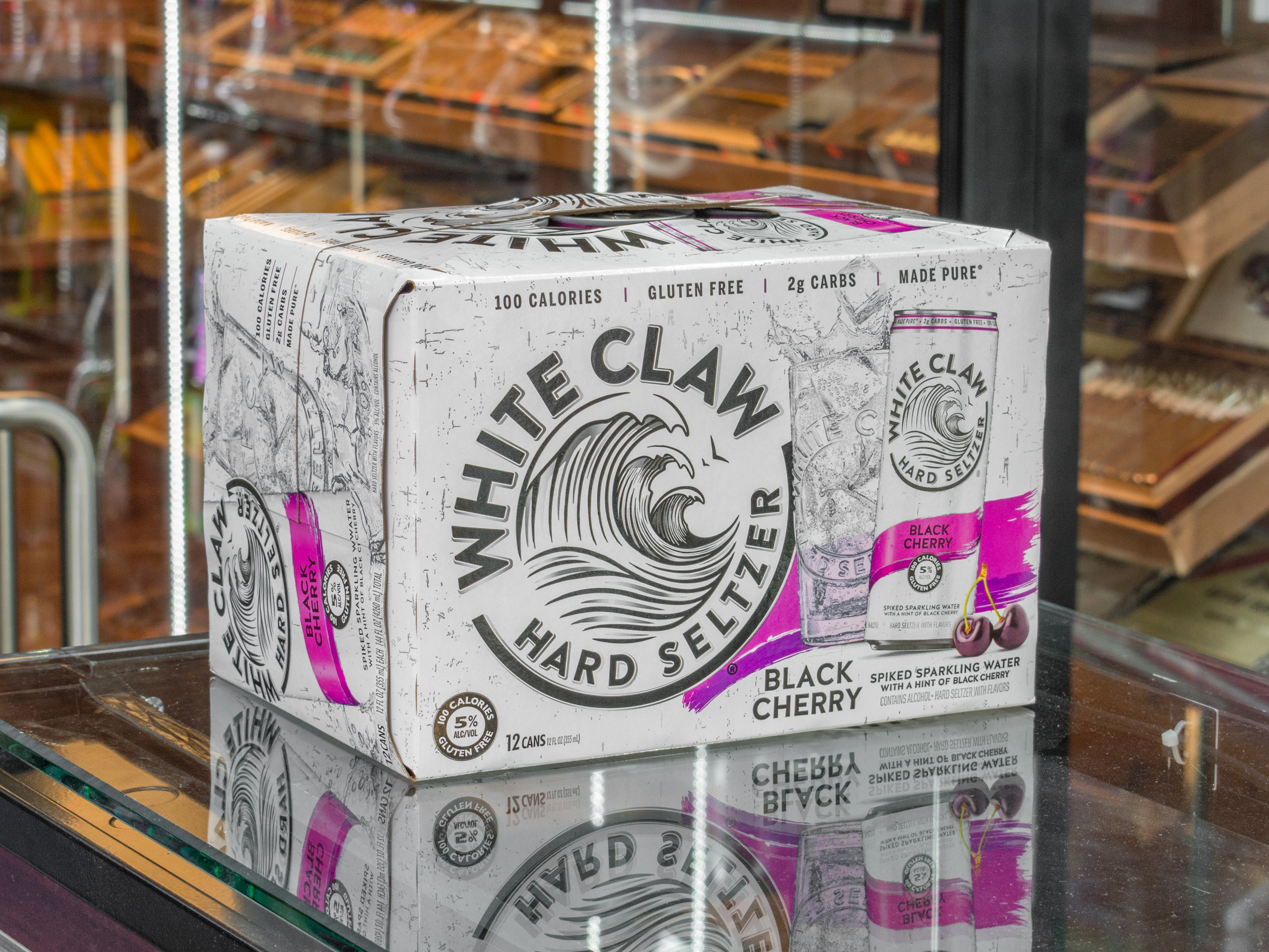 Order 84. 6 Pack of Canned White Claw Black Cherry Seltzer food online from ELITE CIGARS AND CONVENIENCE INC store, Lindenhurst on bringmethat.com