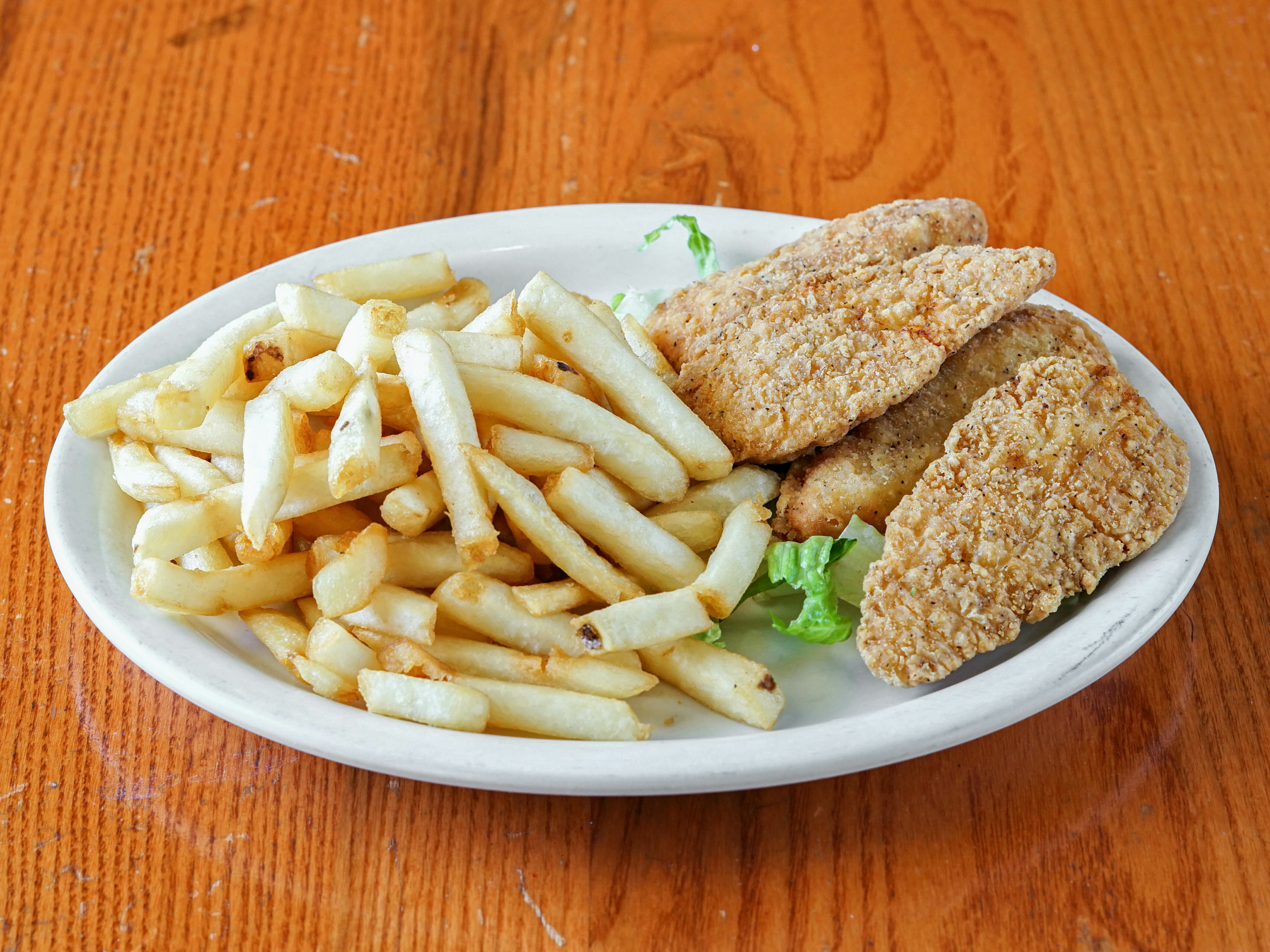 Order 4 Piece Chicken Fingers and Fries Combo Platter food online from Martellucci Pizzeria store, Bethlehem on bringmethat.com