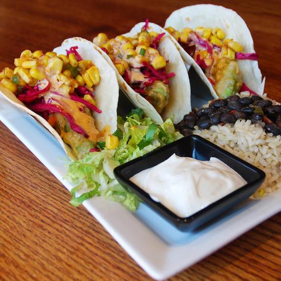 Order FRIED AVOCADO TACOS food online from Tap House Grill store, Lemont on bringmethat.com