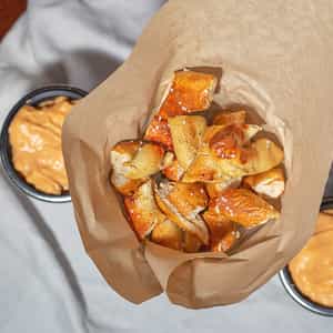 Order Fresh Baked Pieces with 2 Dipping Sauces food online from The Brass Tap store, Greenfield on bringmethat.com
