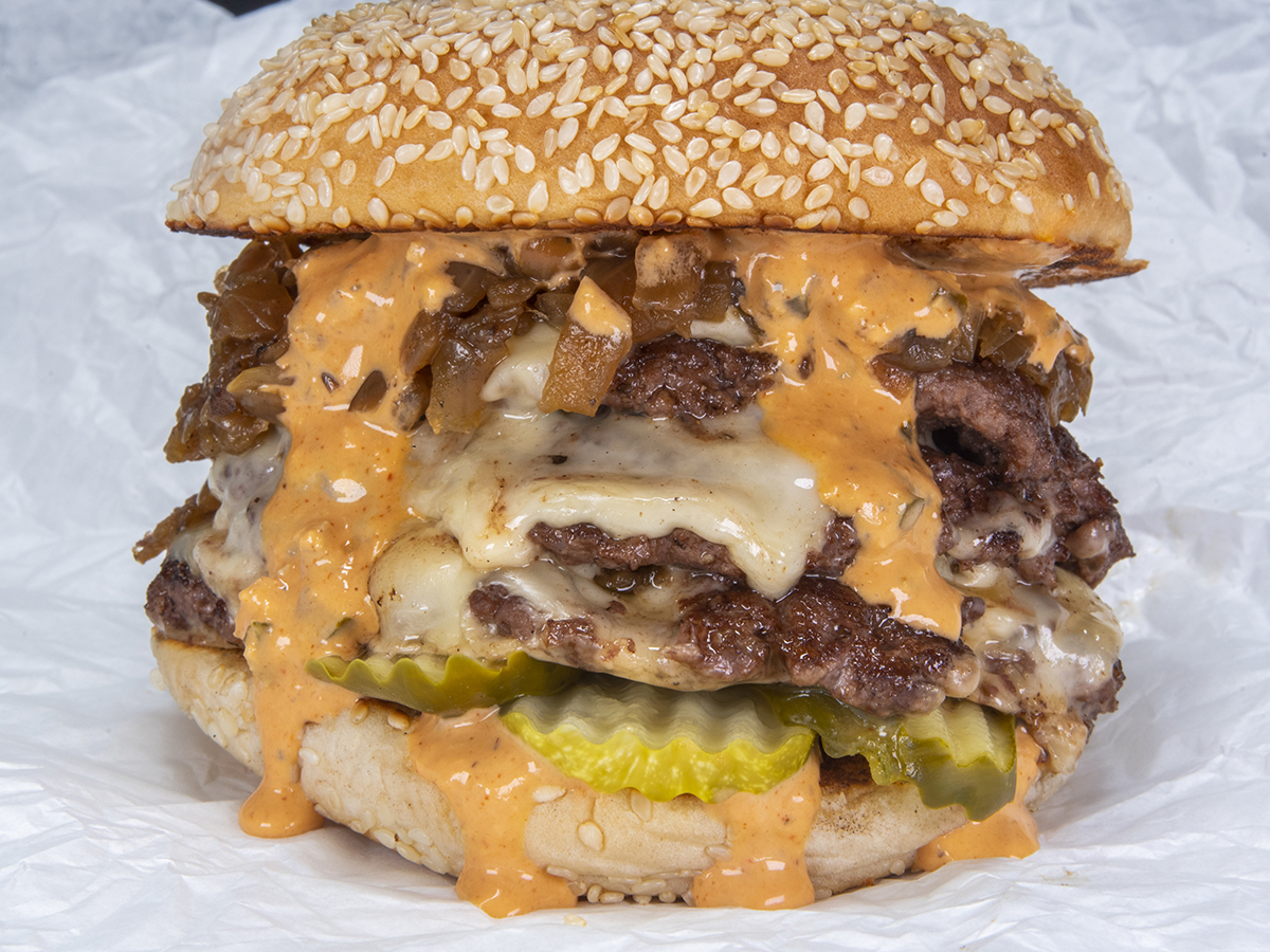 Order Triple Smash Burger food online from Big Belly Burgers store, Denver on bringmethat.com