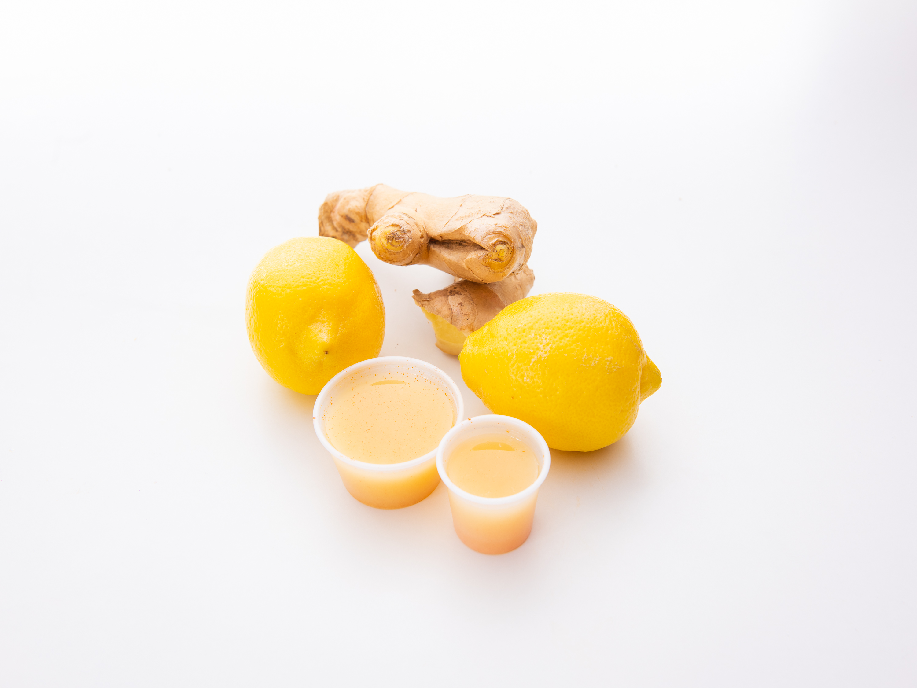 Order Lemon Ginger Shot food online from Liquid Nirvana store, Avon on bringmethat.com