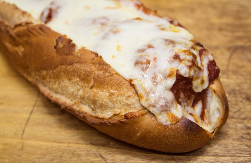 Order Meatball Parmigiana Hero - 12" food online from NYPD Pizza store, Orlando on bringmethat.com