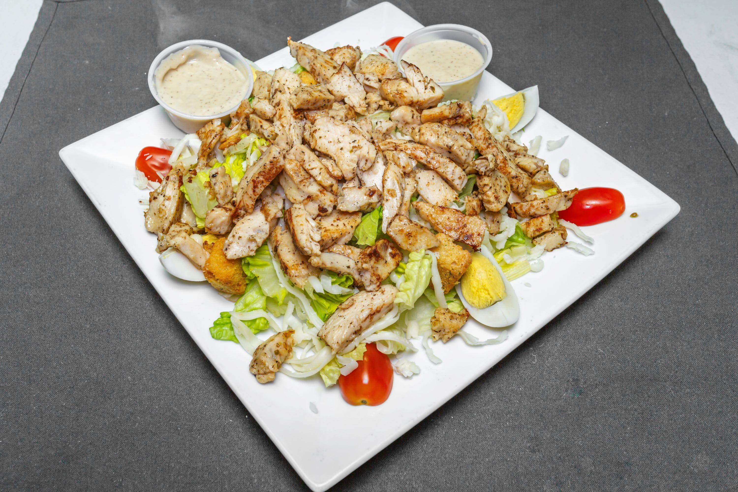 Order Chicken Caesar Salad - Salad food online from Pizza Como store, Lehighton on bringmethat.com