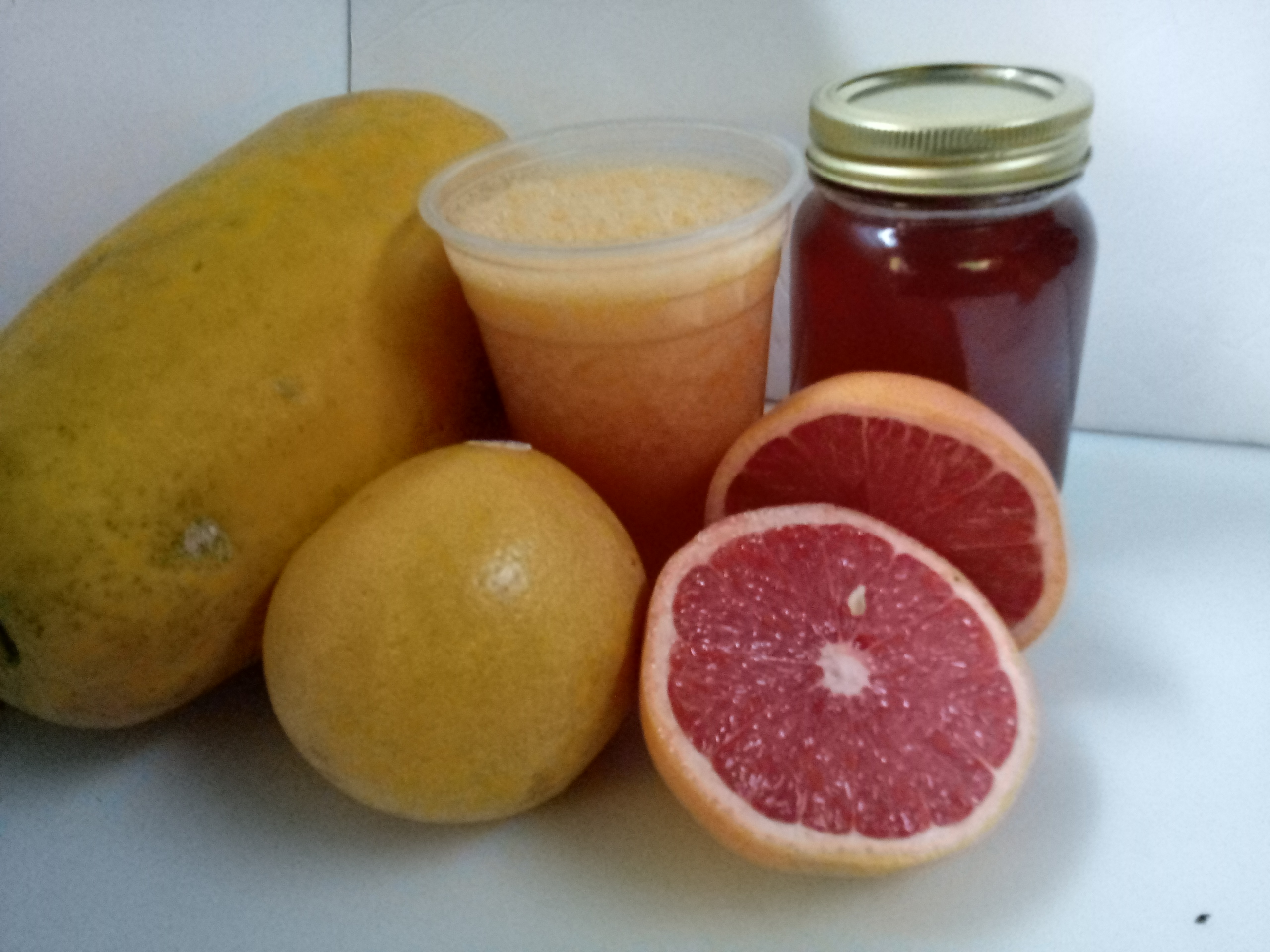 Order #29 Grapefruit, Papaya, Honey food online from El Papayon store, Ontario on bringmethat.com