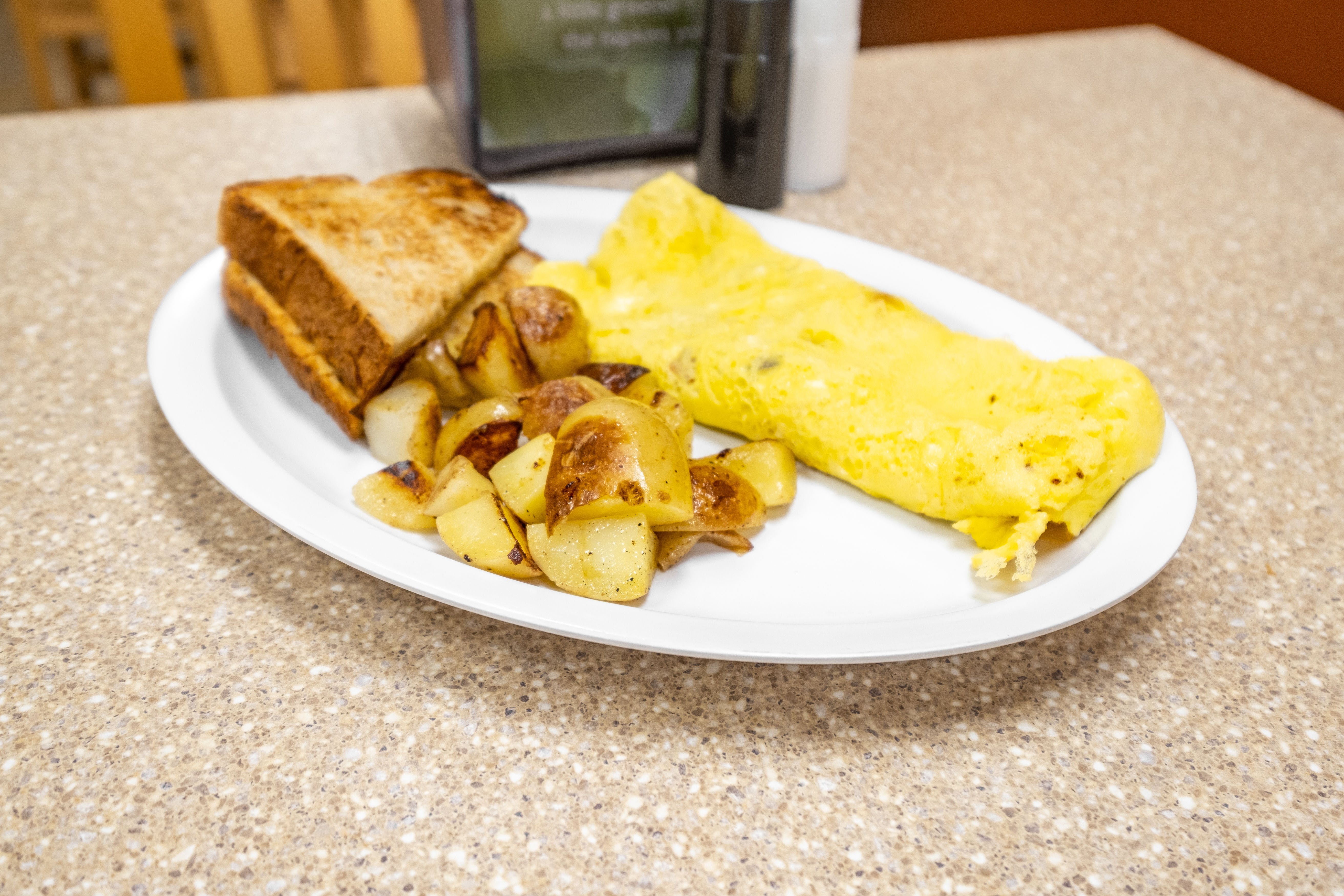 Order Cheese Omelet Breakfast - Omelete food online from Roma Breakfast & Pizzeria store, Columbia on bringmethat.com