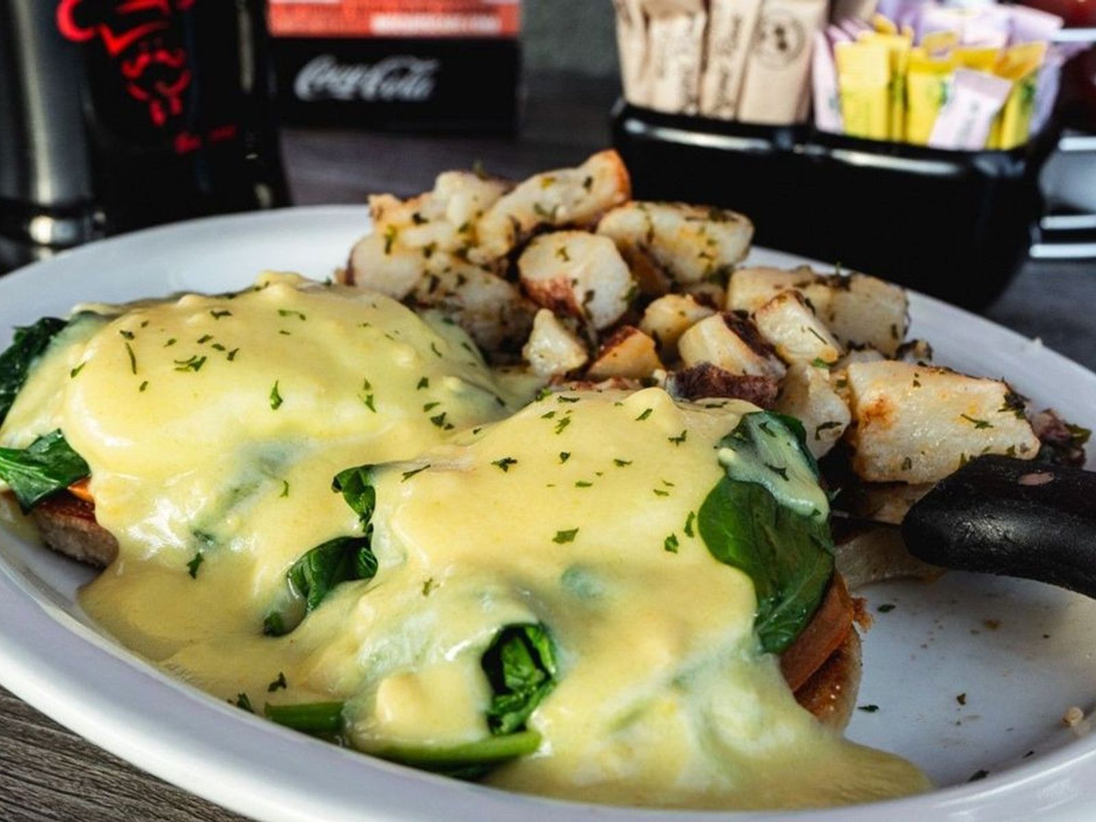 Order Florentine Benedict - OO food online from Biscuits Cafe store, Chandler on bringmethat.com