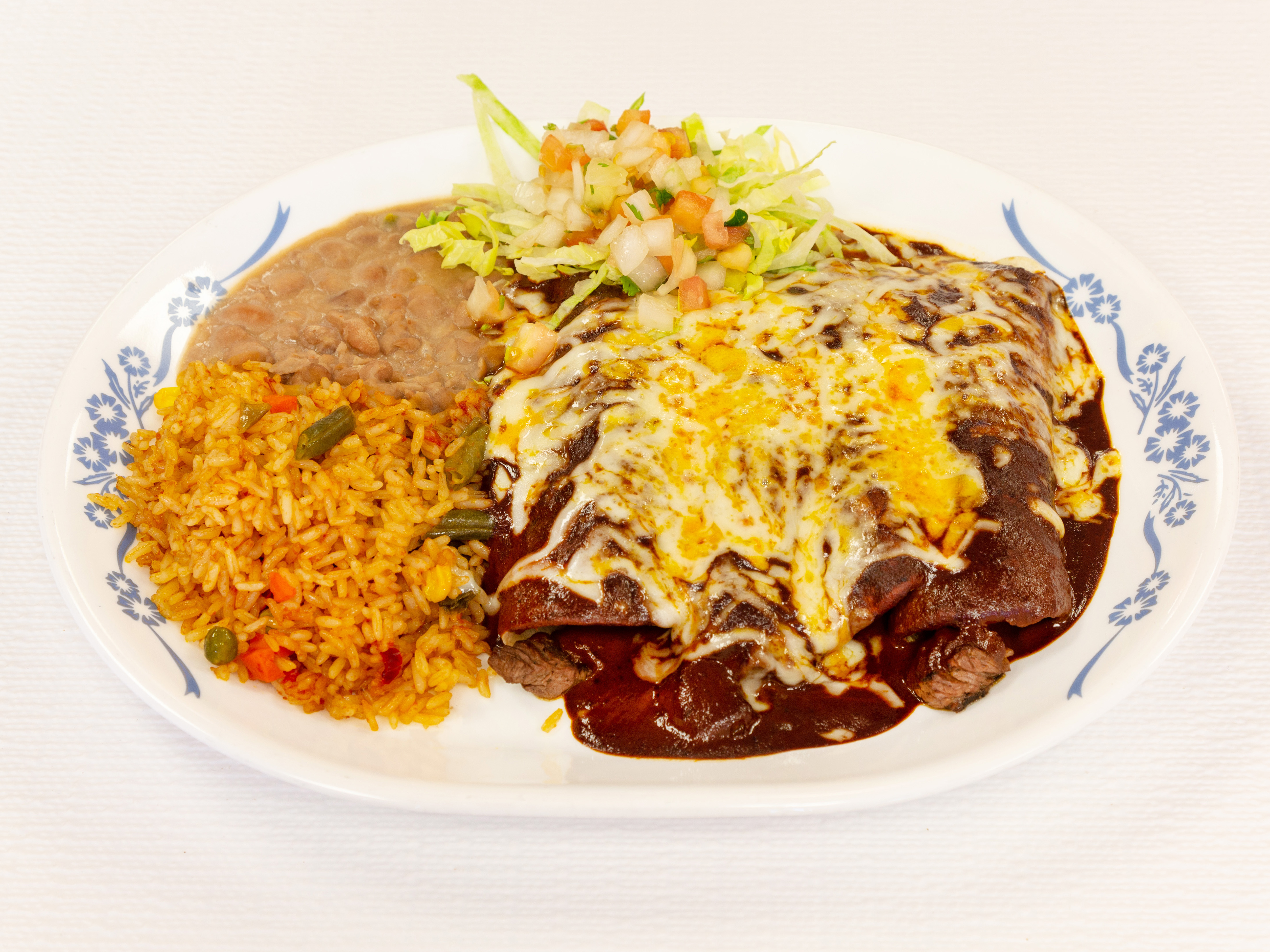 Order Enchiladas de Mole Poblano food online from Fandango Mexican Grill store, West Orange on bringmethat.com